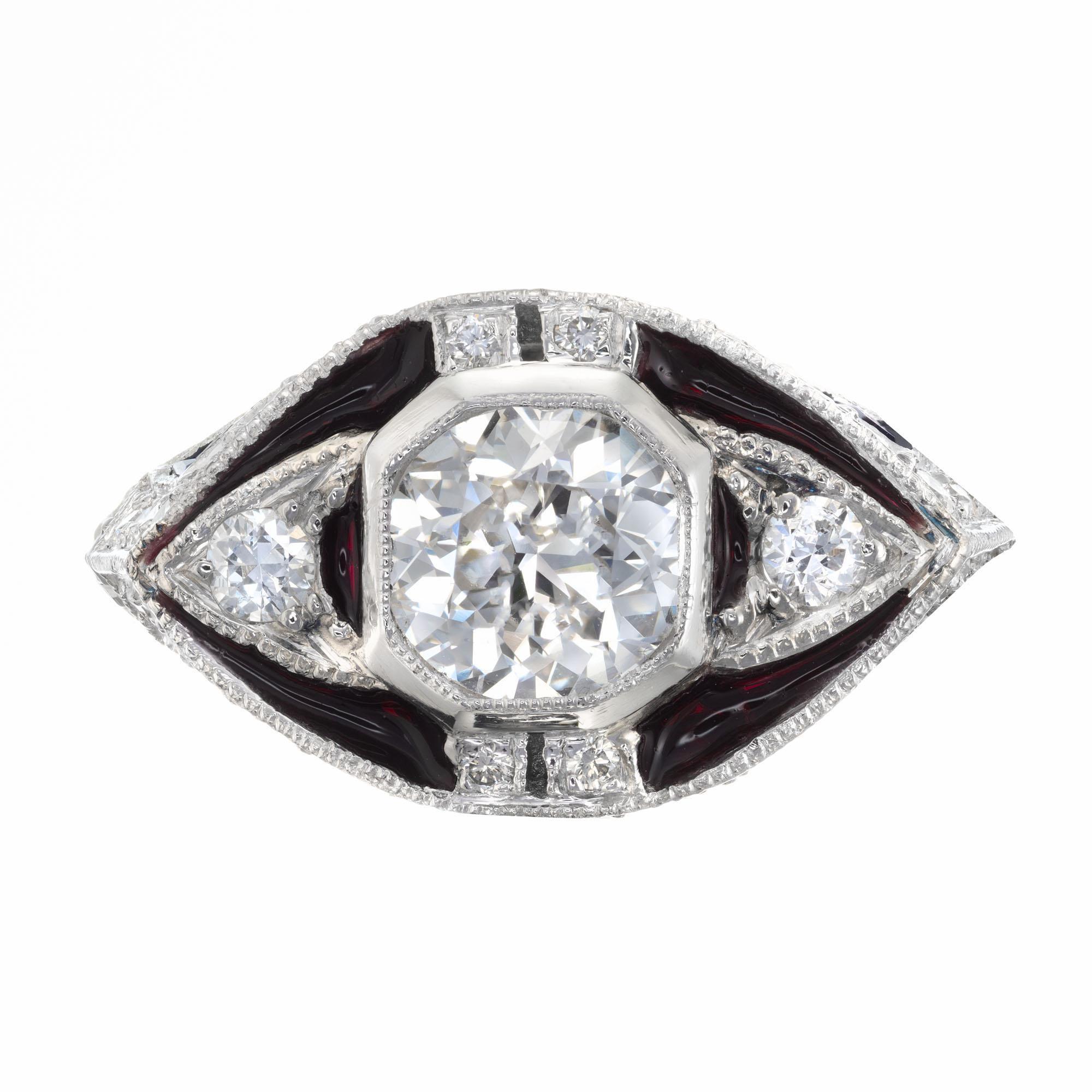 1950's Diamond and sapphire red enamel engagement ring. Round old European center diamond in a hand engraved platinum setting with pave set full cut diamonds, custom cut genuine sapphires and red enamel accents.  EGL certified. note: the red enamel