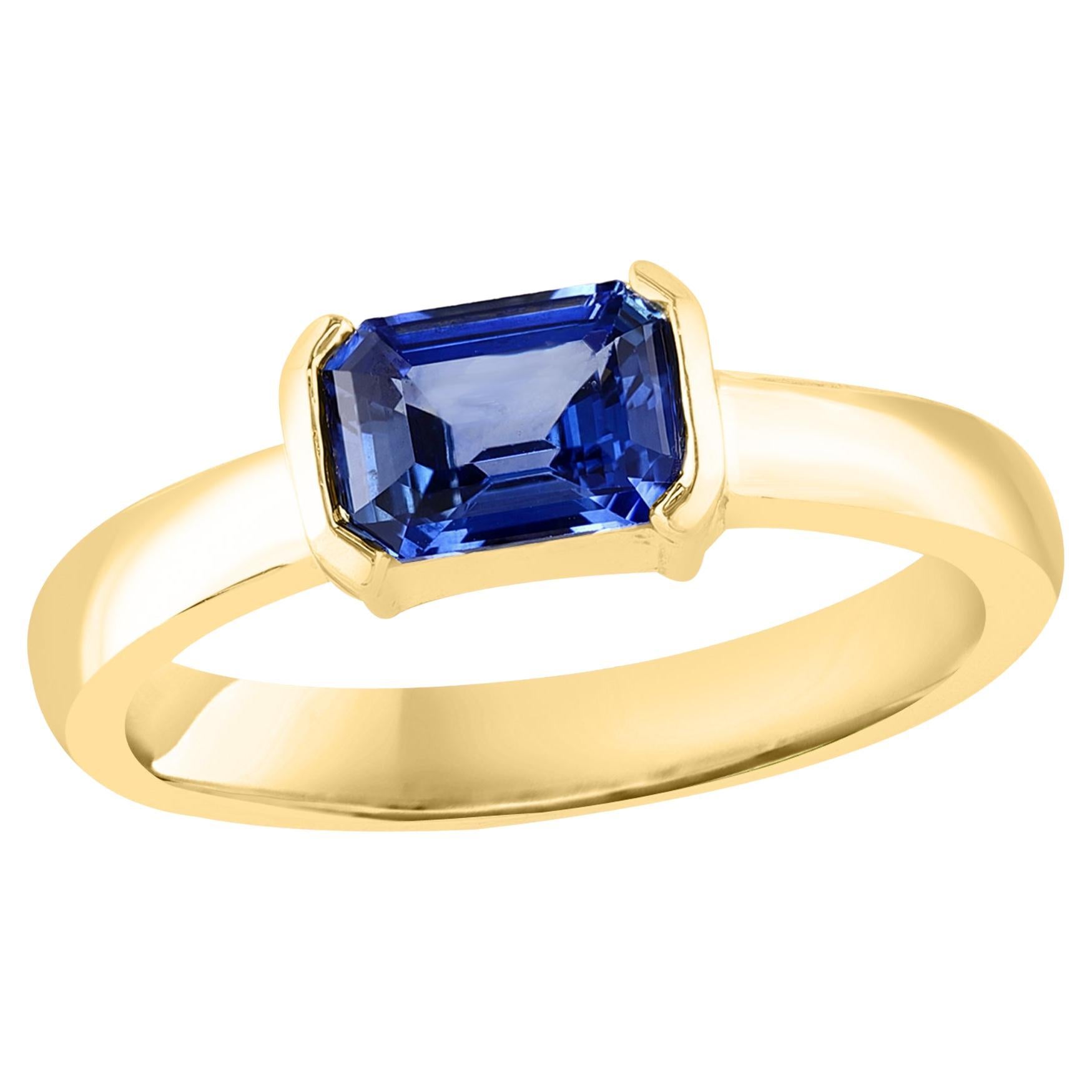 1.06 Carat Emerald Cut Blue Sapphire Band Ring in 14K Yellow Gold For Sale