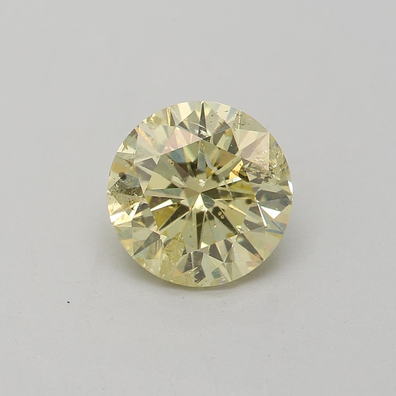 Women's or Men's 1.06 Carat Fancy Yellow Round cut diamond I3 Clarity GIA Certified For Sale