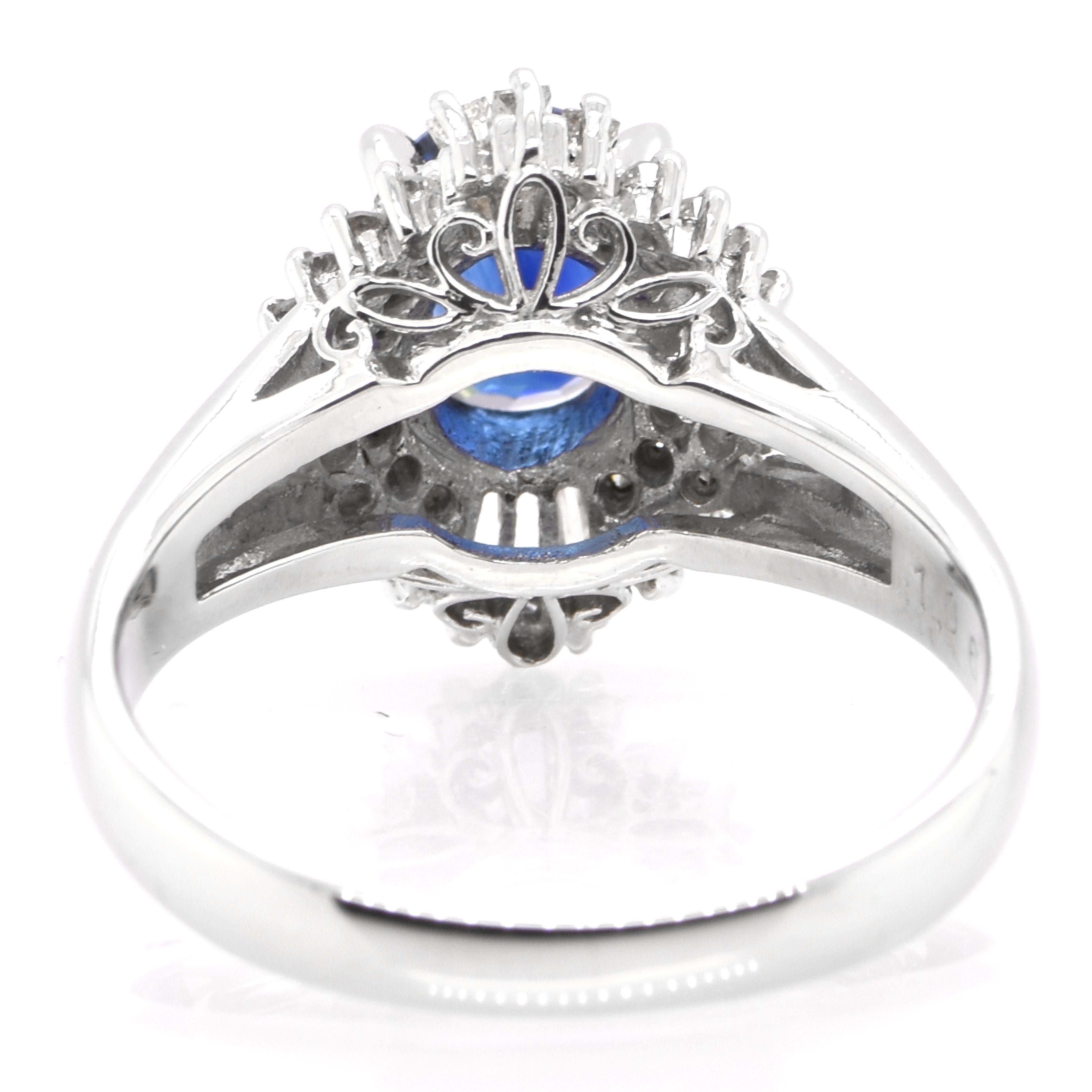 Modern 1.06 Carat Natural Royal Blue Sapphire & Diamond Ballerina Ring set in Platinum For Sale