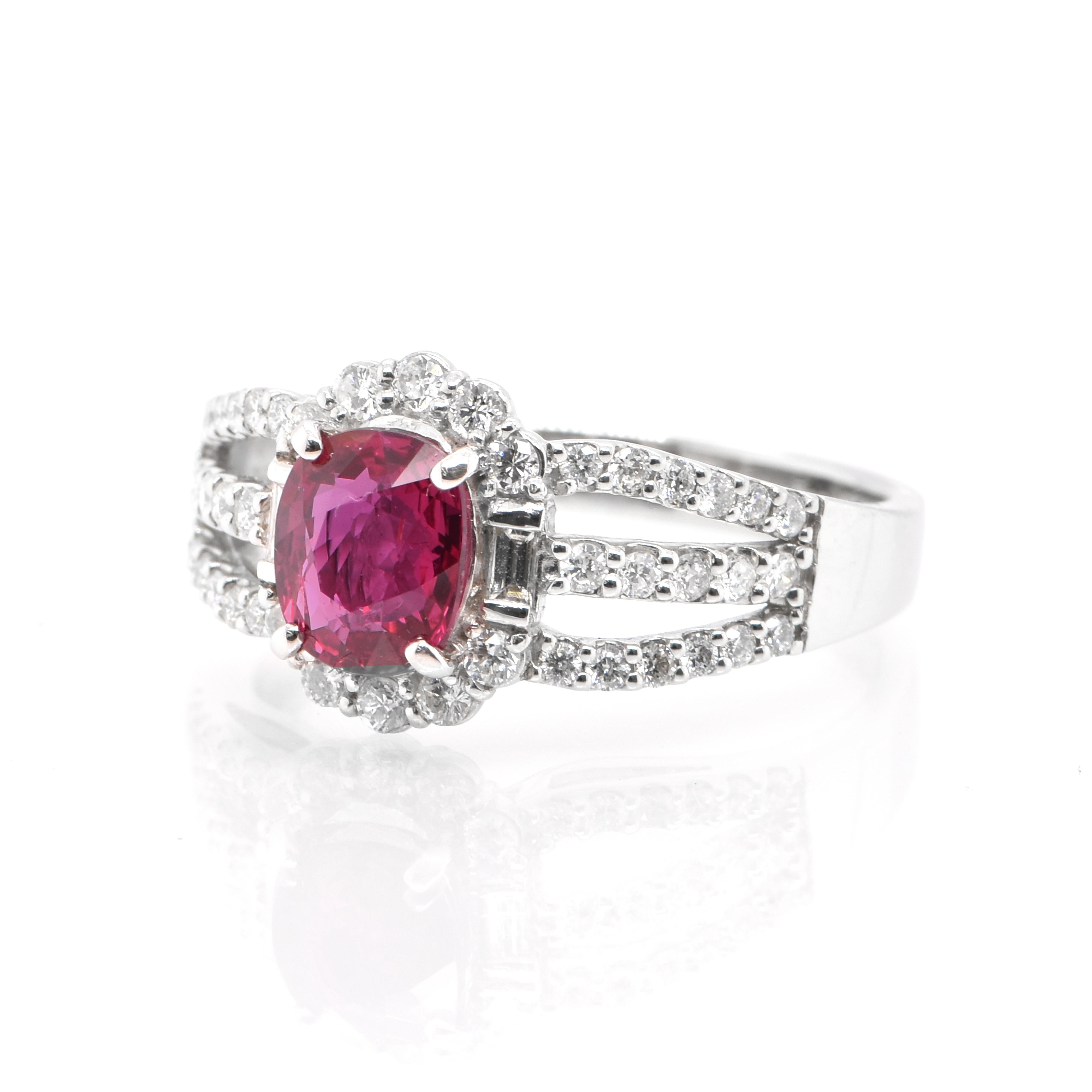 A beautiful ring featuring a 1.06 Carat, Natural Ruby and 0.45 Carats of Round Brilliant Diamond Accents set in Platinum. Rubies are referred to as 