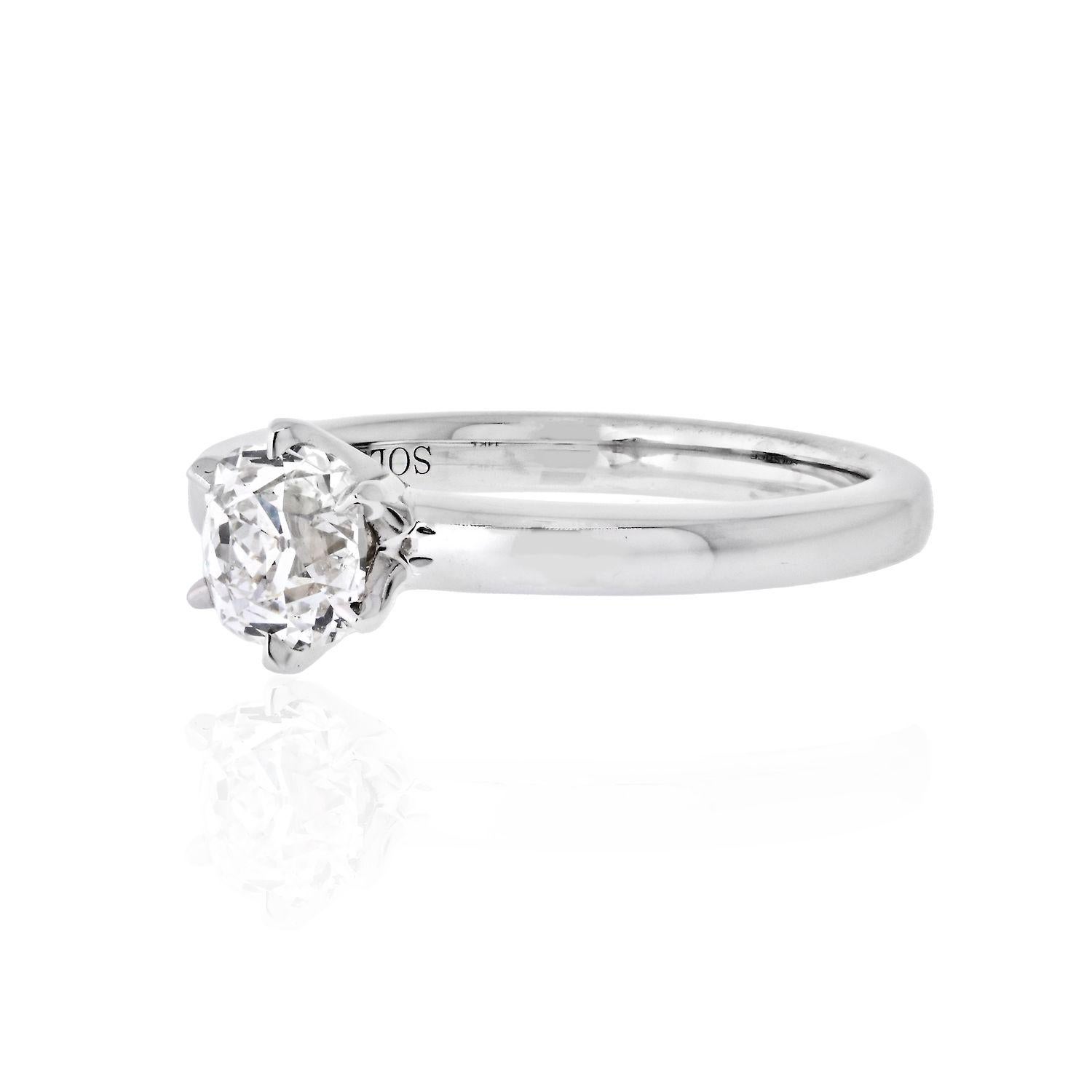 This solitaire style engagement ring is the perfect marriage of modern and vintage. It features a 1.06 carat Old Mine Cut diamond in a modern 14 karat, 2.5mm wide white gold setting. The diamond, has F color and Si1 clarity certified by GIA and is