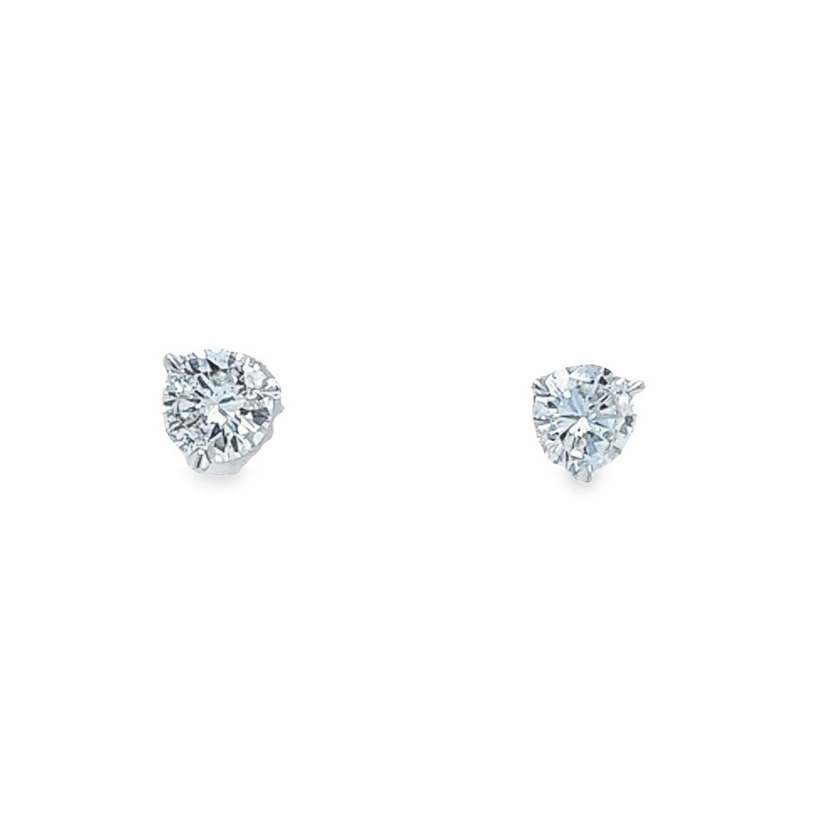 Round Cut 1.06 Carat Total Weight Diamond Stud Earrings For Sale