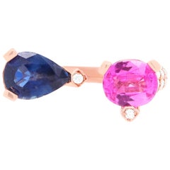 1.06 Carat Two-Stone Pink Sapphire, Blue Sapphire, and Diamond Ring