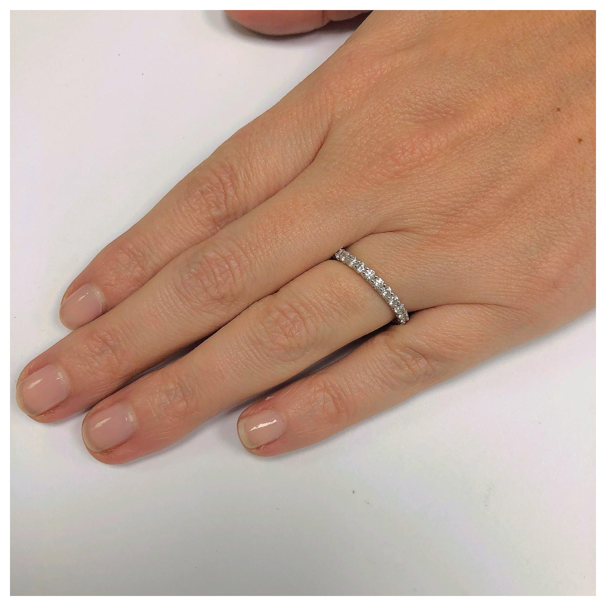 This stunning shared prong eternity band holds 27 diamonds G color SI1 clarity totaling 1.06 ct. It is made in Platinum and sits low on the finger in a finger size 6. Not your size, not a problem! We can make one to fit! If you don't see something,