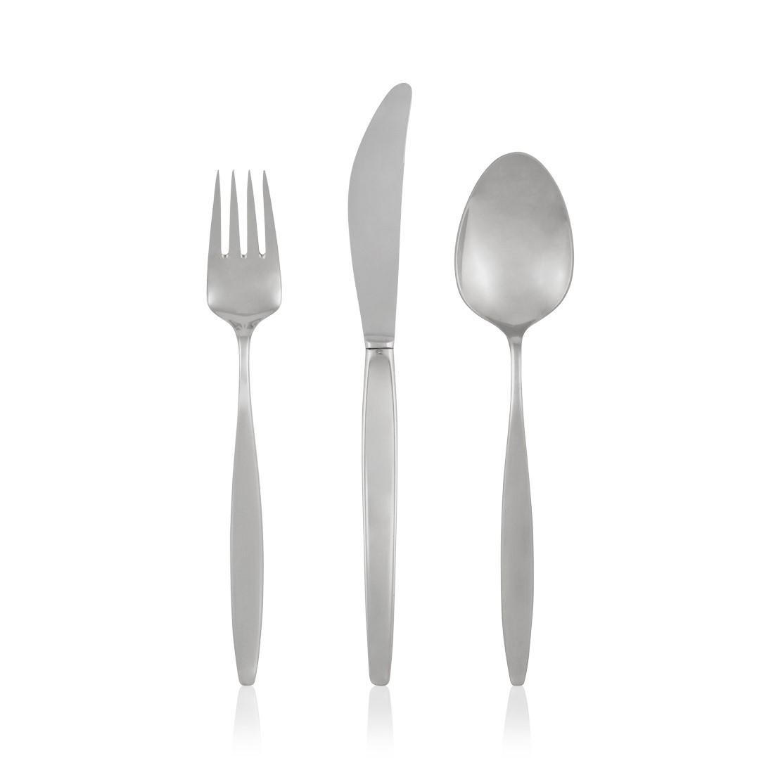 This is a Georg Jensen Cypress silverware service, with twelve settings of eight pieces plus servers. Cypress is design #99 by Tias Eckhoff. Norwegian designer Tias Eckhoff’s Cypress was the winning design in a competition to design a flatware