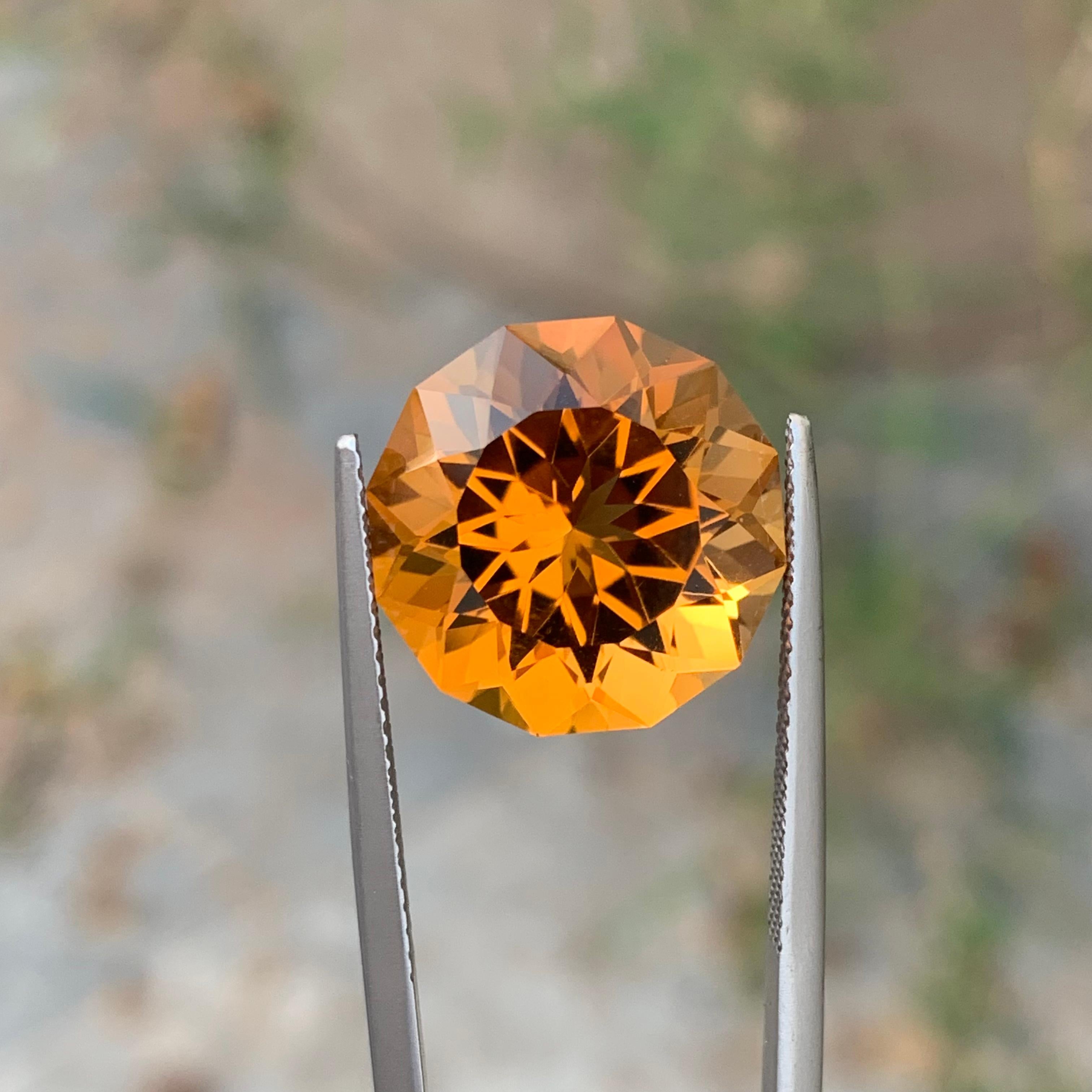 Faceted Mandarin Citrine 
Weight: 10.60 Carats 
Dimension: 14.4x14.4x10.1 Mm
Origin: Brazil 
Color: Orange 
Shape: Round 
Certificate: On Demand 
.
Mandarin citrine is a captivating gemstone that exudes warmth, vibrancy, and elegance. This gem is a