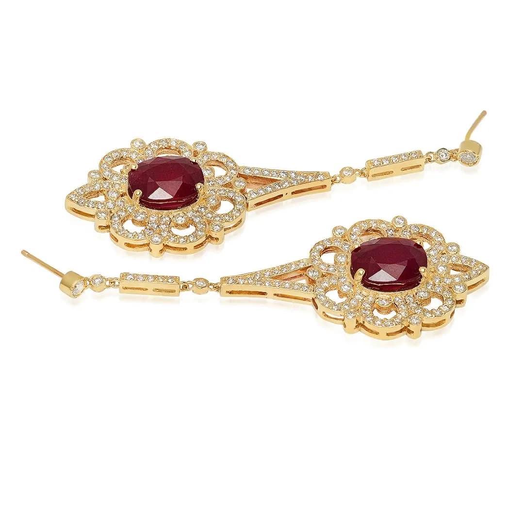 10.60Ct Natural Ruby and Diamond 14K Solid Yellow Gold Earrings

Total Natural Rubies Weight: Approx.  8.00 Carats

Ruby  Measures: Approx. 10 x 8 mm

Ruby Treatment: Fracture Filling

Total Natural Round Cut Diamonds Weight: Approx.  2.60 Carats