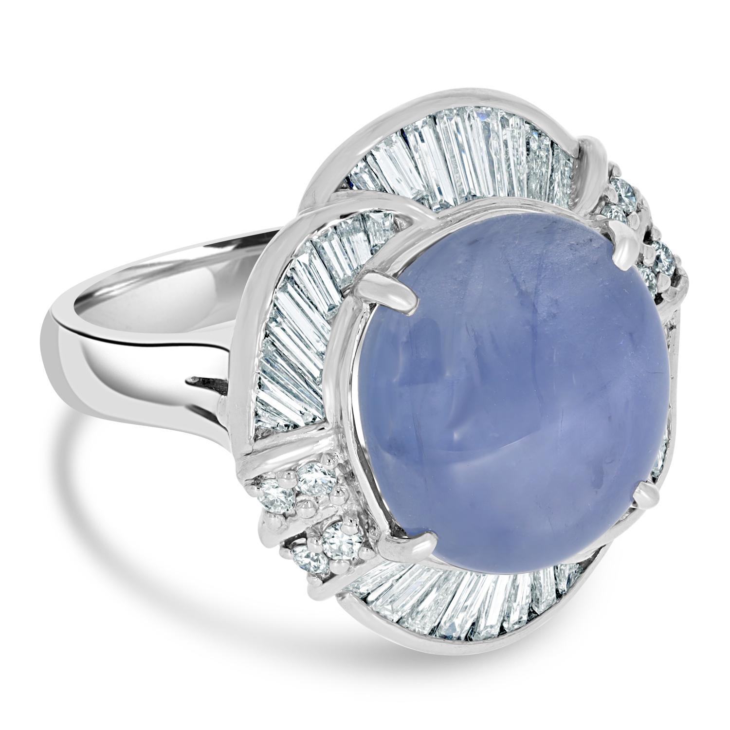 Modern 10.60ct Star Sapphire Ring with 0.95tct Diamonds Set in Platinum For Sale