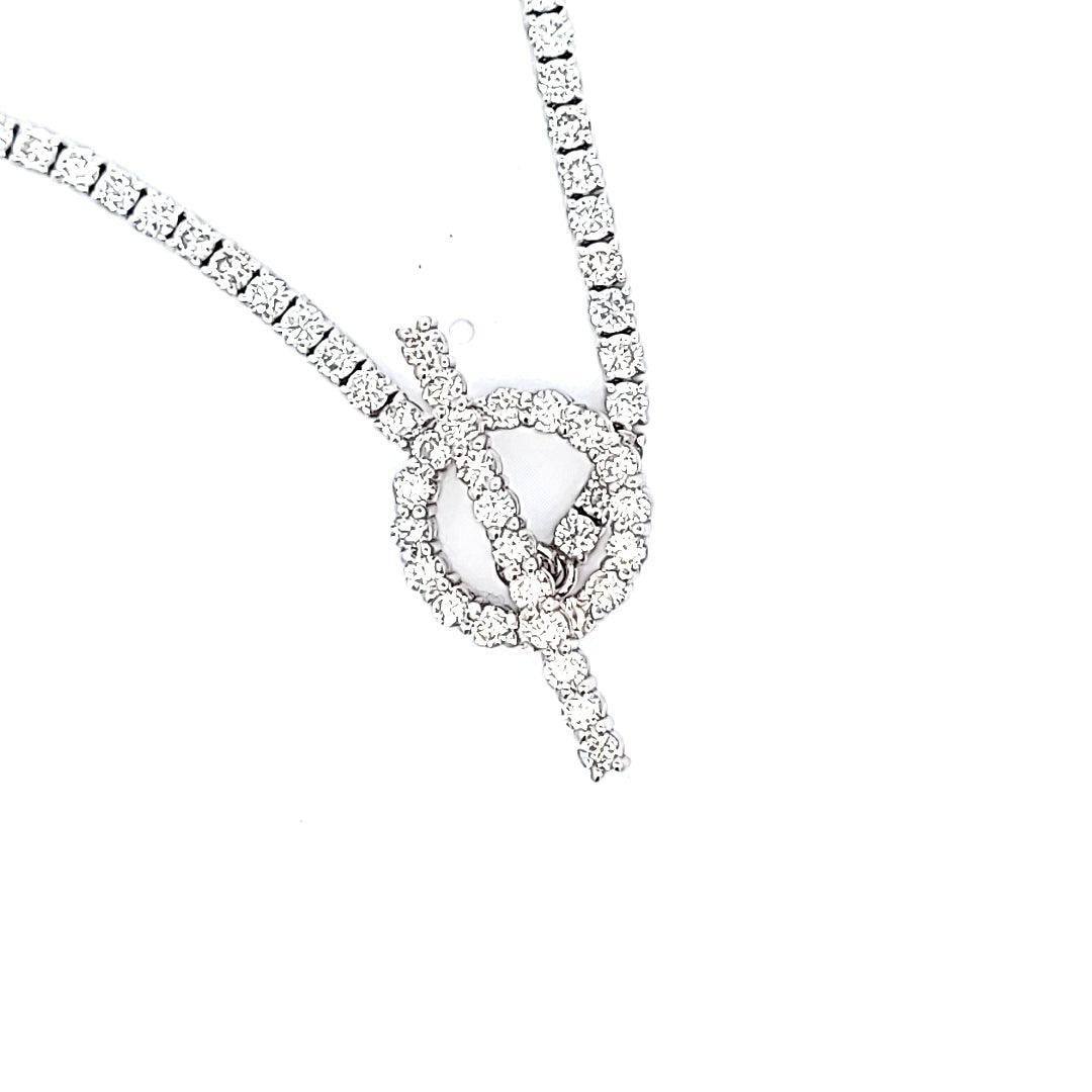 Titre :
Collier Riviera en or blanc 18 carats 10,62 carats diamant rond brillant G VS1


Le style :
Riviera


Métal :
Or blanc 18 carats


Pierre précieuse 1 :
Diamant de 10,62 carats


Nombre de pierres :
177


Couleur :
G


La clarté :
VS1


Forme
