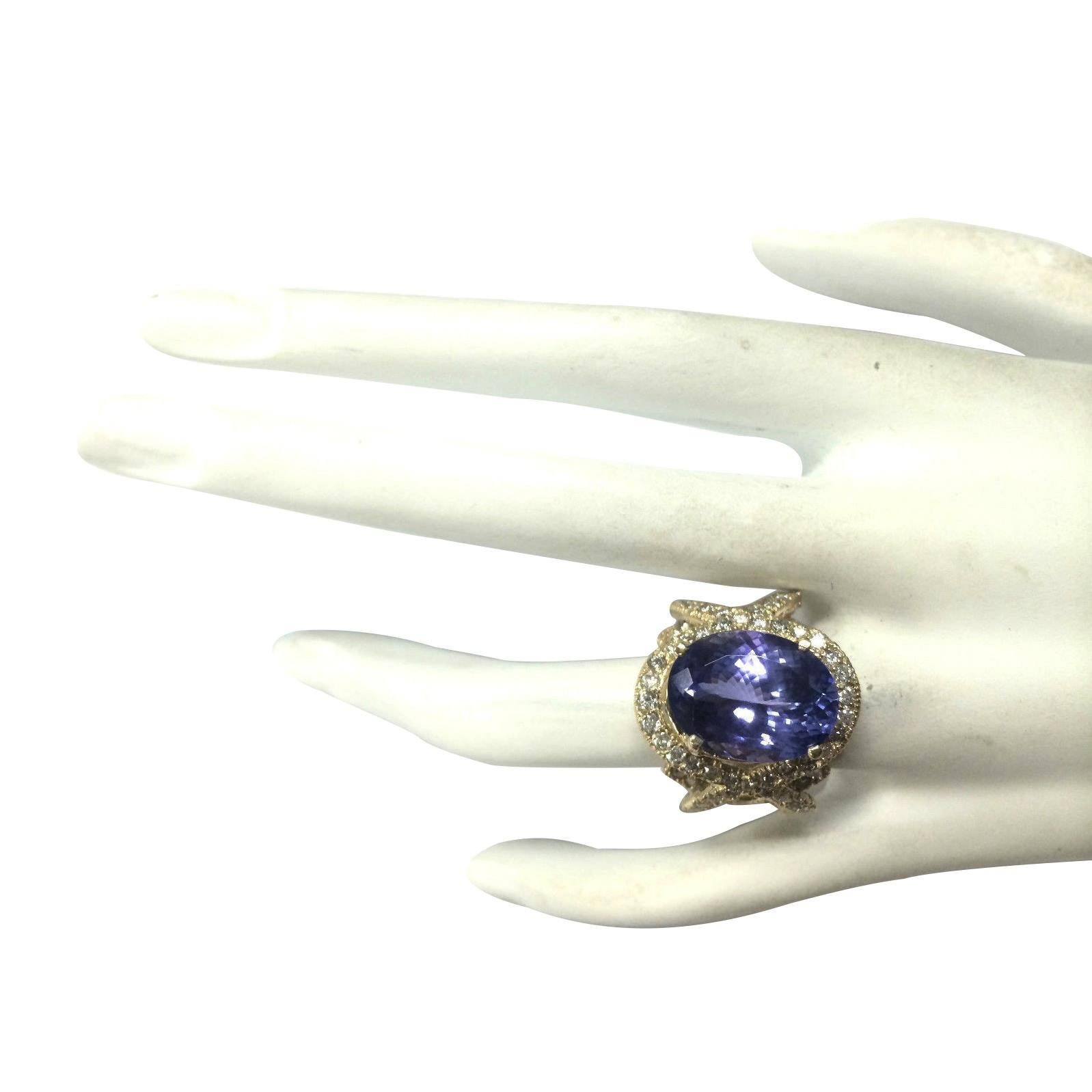 Oval Cut Exquisite Natural Tanzanite Diamond Ring: Crafted in 14 Karat Yellow Gold For Sale