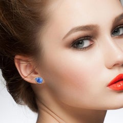 10.63 Carat Carved Tanzanite 18 Karat Gold Diamond Stud Earrings