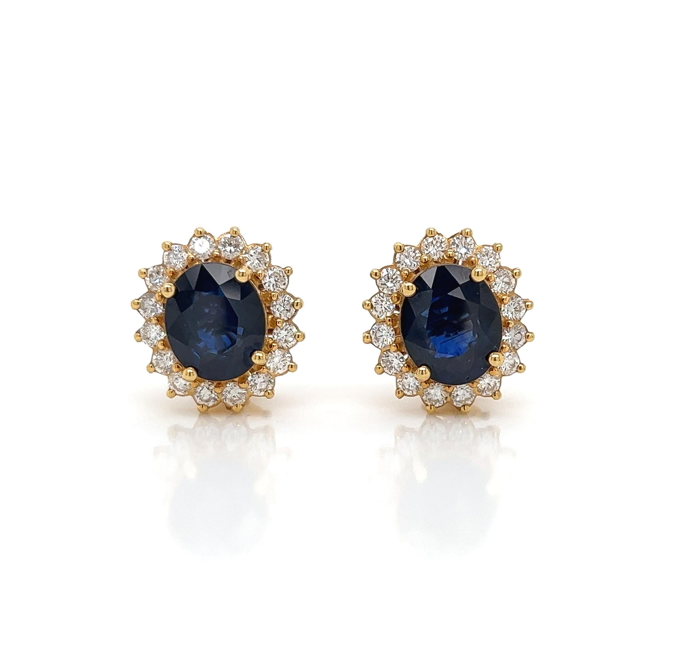 10.63 Total Carat Victorian Style Sapphire and Diamond Earrings in 18K Gold

This gorgeous pair of sapphire earrings are sure to draw all eyes on you. It is created with whopping 8.79 carats of Oval Sapphires, surrounded by a halo of round cut