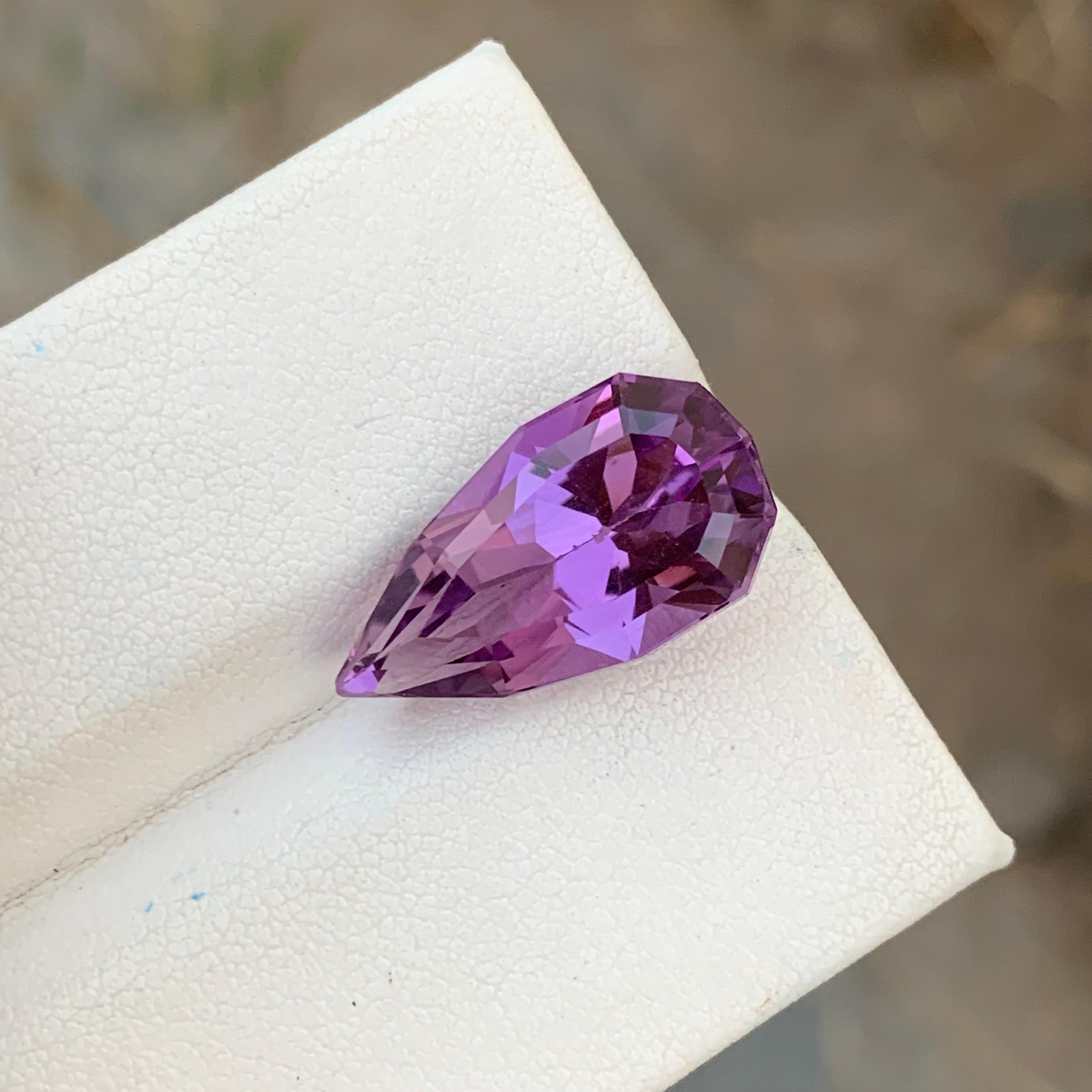 Loose Amethyst
Weight: 10.65 Carats
Dimension: 20 x 10.9 x 9.1 Mm
Colour: Purple
Origin: Brazil
Treatment: Non
Certificate: On Demand
Shape: Tear Drop 

Amethyst, a stunning variety of quartz known for its mesmerizing purple hue, has captivated
