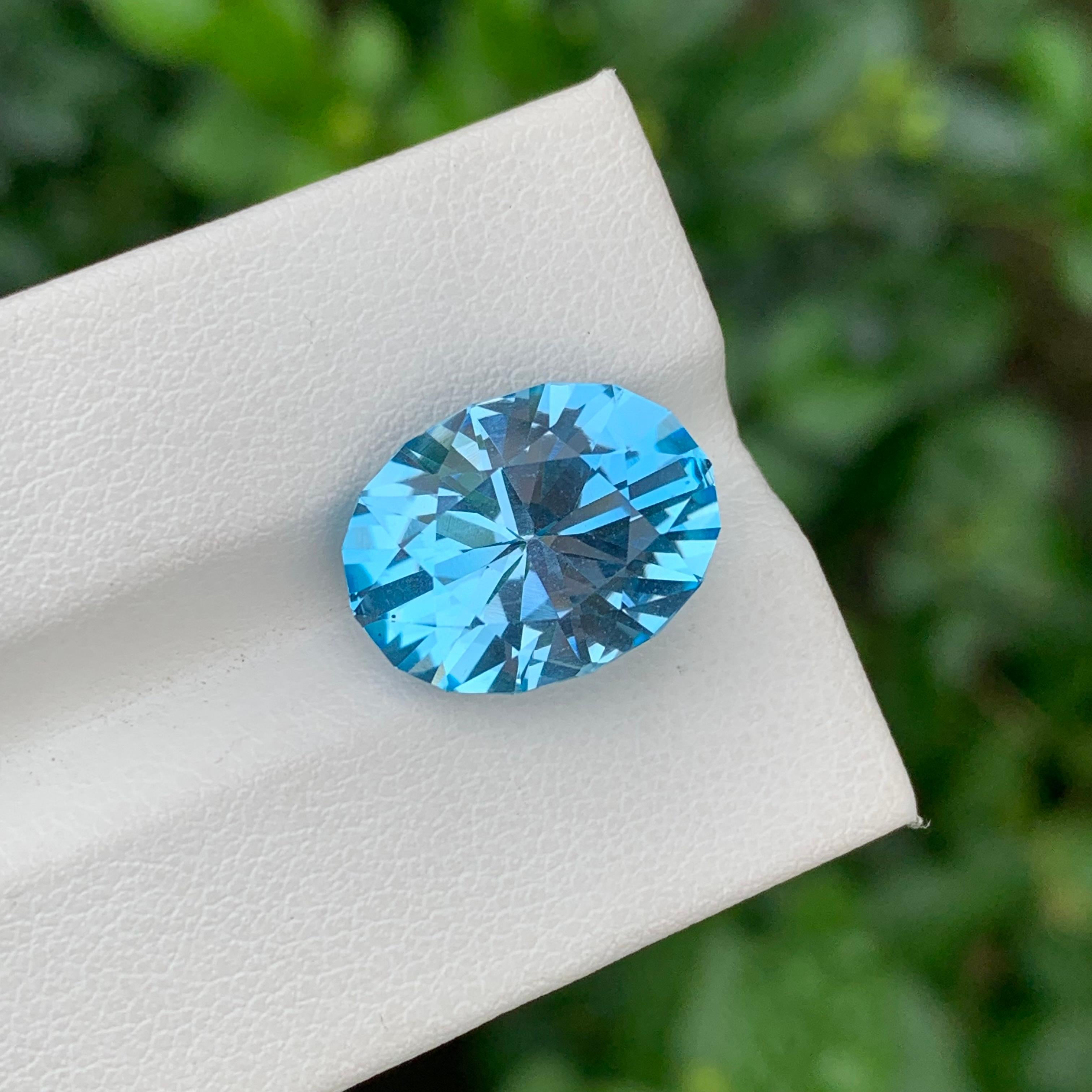 Women's or Men's 10.65 Carat Stunning Loose Blue Topaz Oval Shape Gem For Necklace For Sale
