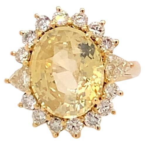10.68 Carat Oval Cut Unheated Yellow Sapphire and Diamond Ring in Yellow Gold For Sale