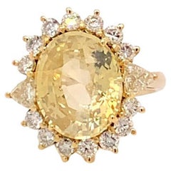10.68 Carat Oval Cut Unheated Yellow Sapphire and Diamond Ring in Yellow Gold