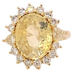 10.68 Carat Oval Cut Unheated Yellow Sapphire and Diamond Ring in Yellow Gold