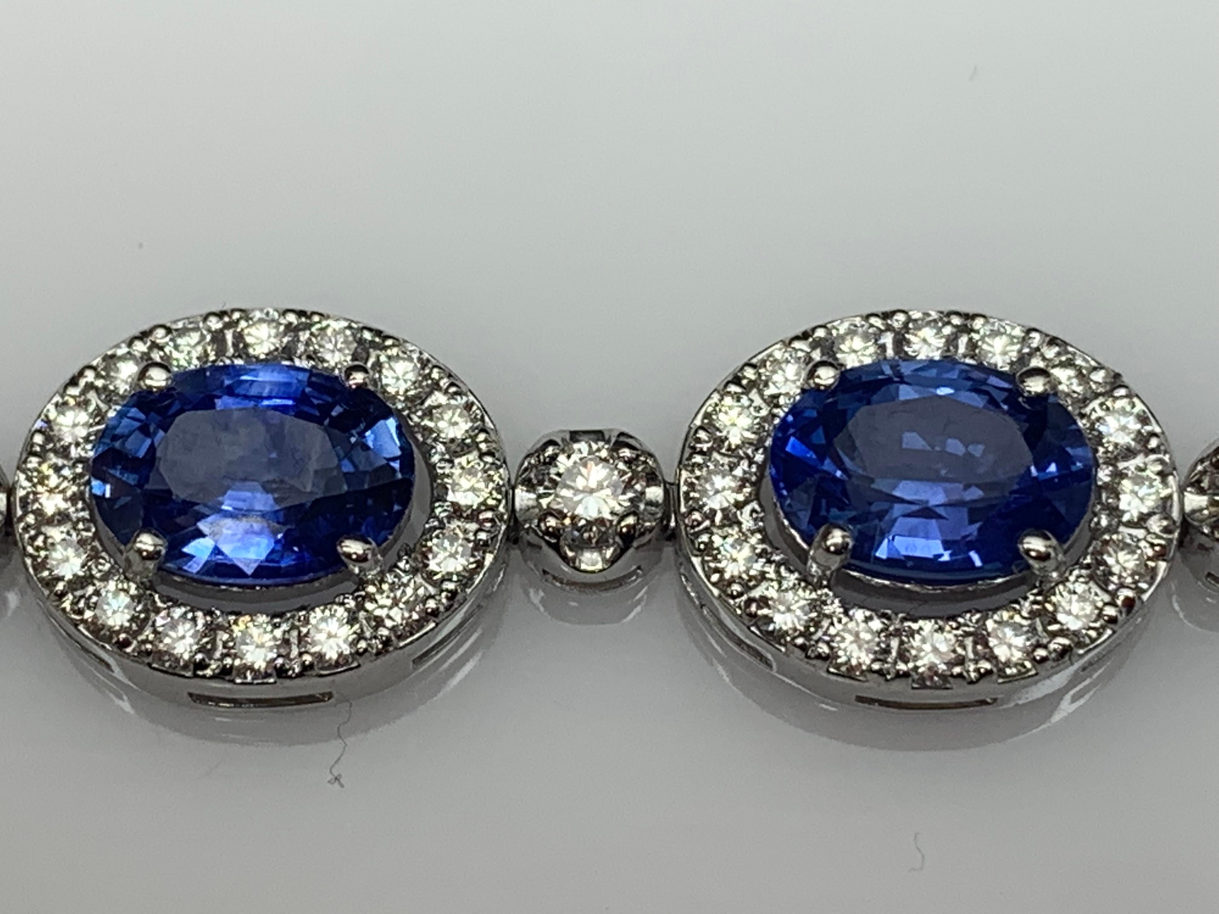 Oval Cut 10.69 Carat Oval Blue Sapphire and Diamond Halo Bracelet in 14K White Gold For Sale