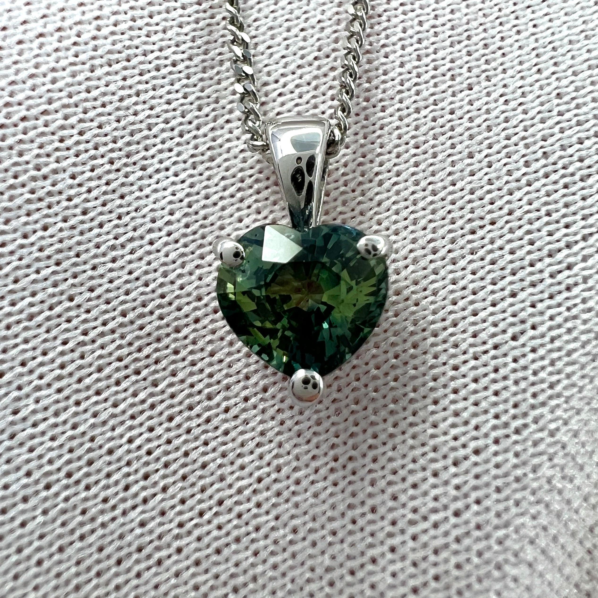 Untreated Heart Cut Colour Change Sapphire 18k White Gold Solitaire Pendant Necklace.

A fine IGI certified 1.06 carat untreated sapphire with stunning colour change effect. 
Changing colour depending on the light its viewed in. Very rare for