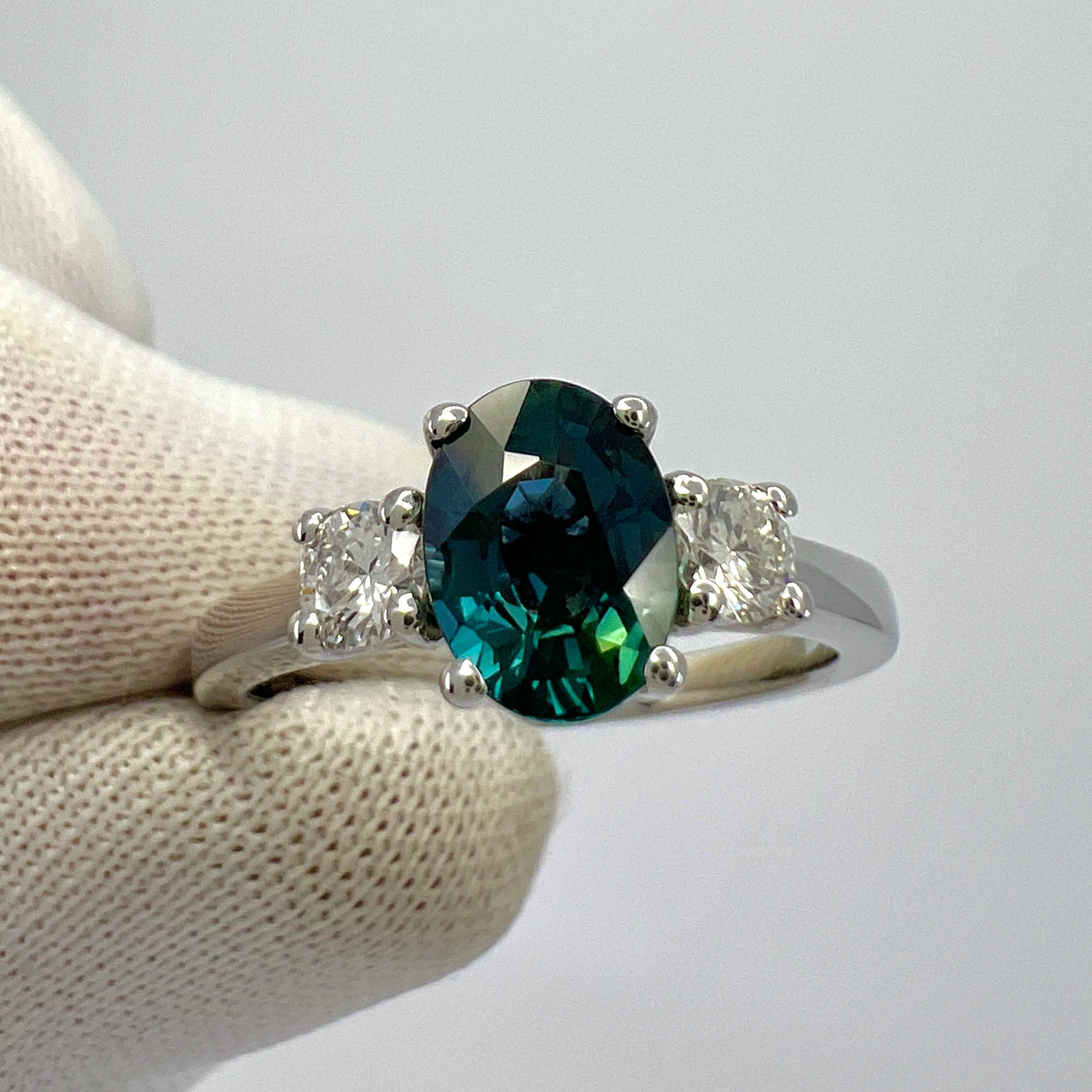 Natural Deep Blue Sapphire And Diamond Three Stone 18k White Gold Ring. 1.26 Total Carat.

1.06Carat centre sapphire with a fine deep blue colour and excellent clarity, a very clean stone. VVS Also with an excellent oval cut showing the fine colour