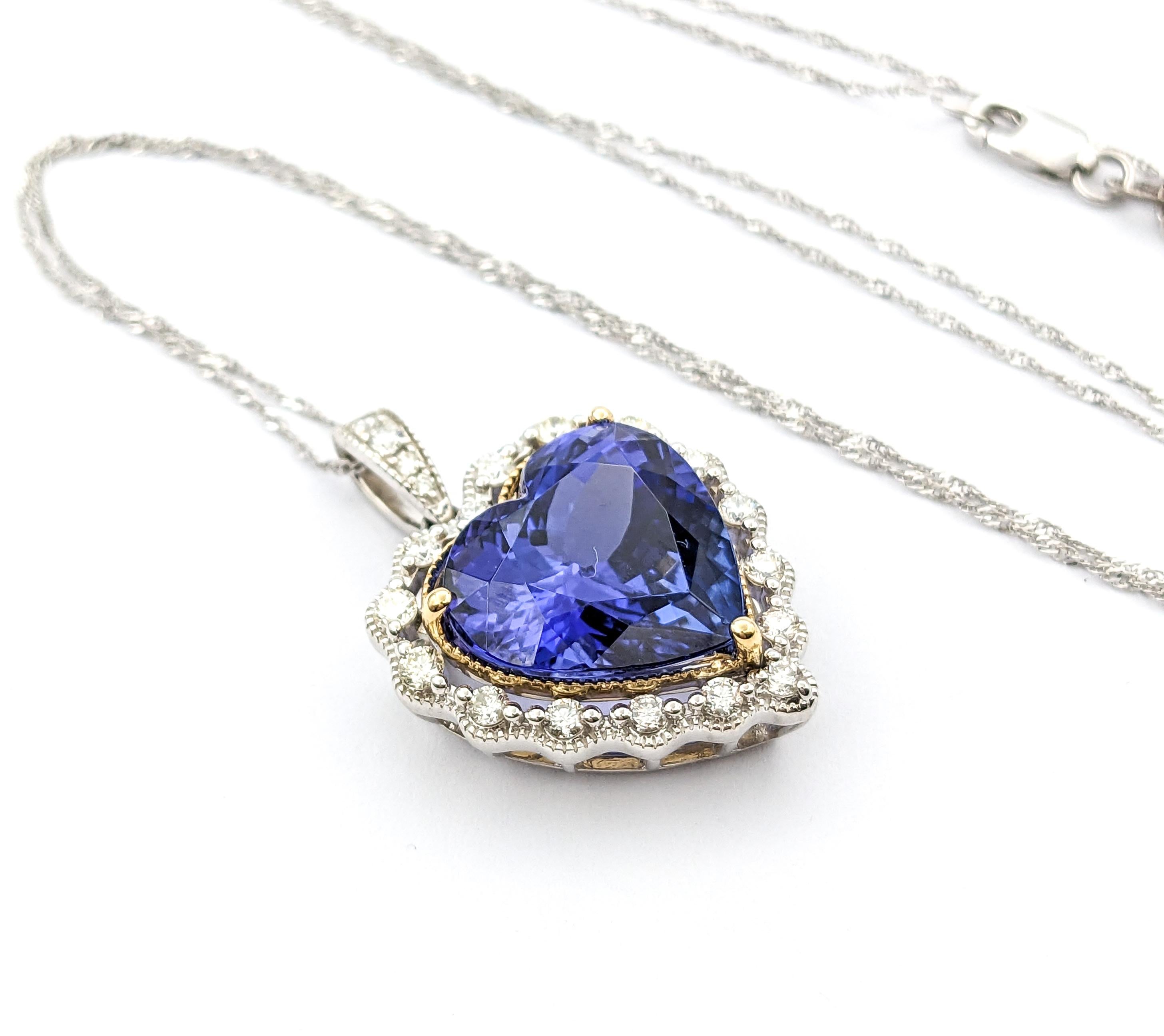 10.6ct Tanzanite Pendant With Diamond Halo In Two Tone Gold

Introducing this exquisite Gemstone Fashion Pendant crafted in 14k white gold. This pendant features a stunning 10.6ct Tanzanite centerpiece, complemented by .60ctw of diamonds. These