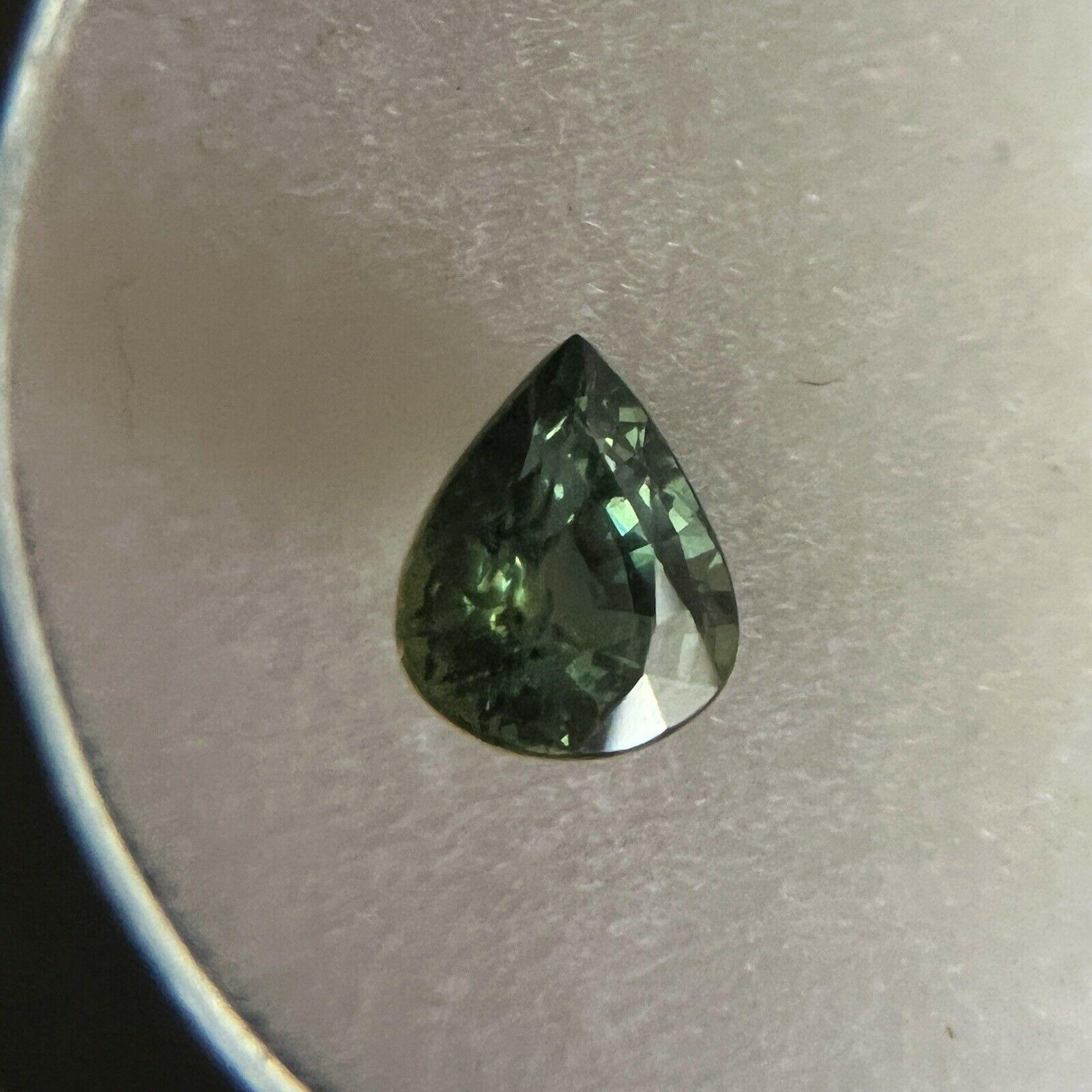 1.06ct Vivid Green Australia Sapphire Pear Teardrop Cut Loose Gem 6.8 x 5.5mm

Natural Vivid Green Blue Sapphire Gemstone. 
1.06 Carat with a beautiful vivid green colour and good clarity. Some small natural inclusions visible when looking closely