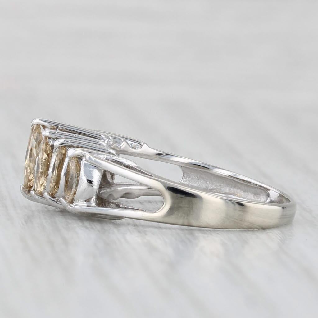 Gemstone Information:
- Natural Diamonds -
Total Carats - 1.06ctw
Cut - Marquise Brilliant
Color - Champagne (C2 - C3)
Clarity - SI1 - I1

Metal: 14k White Gold 
Weight: 3.2 Grams 
Stamps: 14k
Face Height: 7.5 mm 
Rise Above Finger: 7.3 mm
Band /
