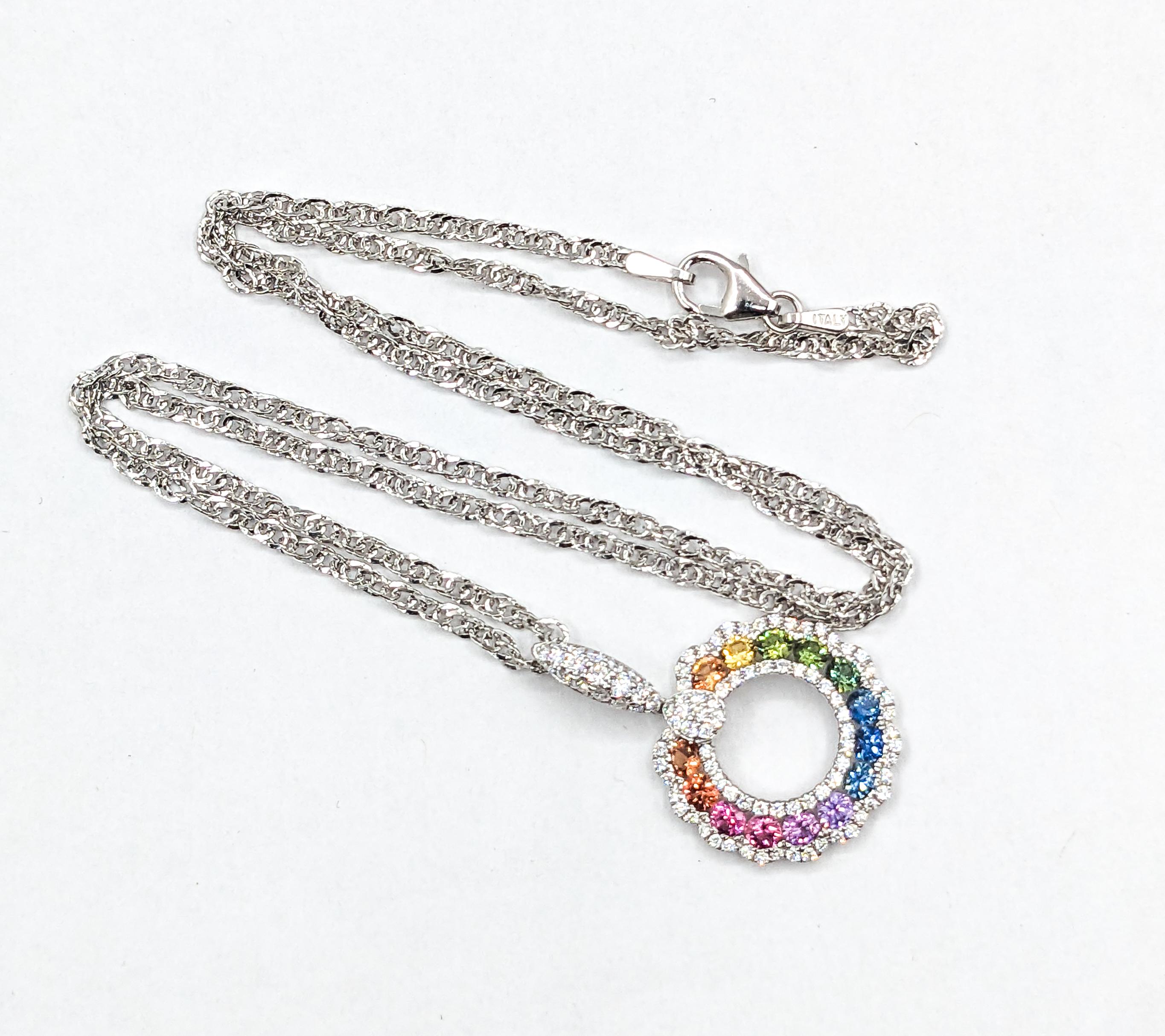 1.06ctw Multicolor Sapphire & Diamond Pendant With Chain In 18k White Gold 

Presenting this enchanting Pendant, a creation of pure refinement in 18kt white gold, featuring a cascade of .45ctw drop diamonds that display SI clarity and a near