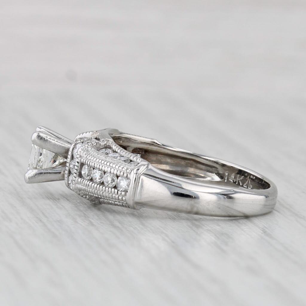 Gemstone Information:
- Natural Diamond -
Carats - 0.50ct 
Cut - Princess Brilliant
Color - H
Clarity - SI1 

- Natural Diamonds -
Total Carats - 0.56ctw
Cut - Round Brilliant
Color - G - H
Clarity - SI1 - I1

Metal: 14 White Gold
Weight: 5.3 Grams