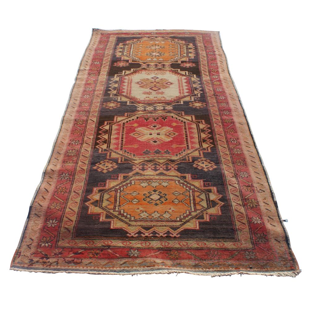 Handwoven Caucasus Karabakh Rug.  

  Karabagh also spelled Karabakh, floor covering handmade in the district of Karabakh (Armenian-controlled Azerbaijan), just north of the present Iranian border. The designs and color schemes tend to be more like
