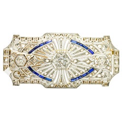 1.07 Carat 18 Karat White Gold Diamond Blue Sapphire Art Deco Brooch