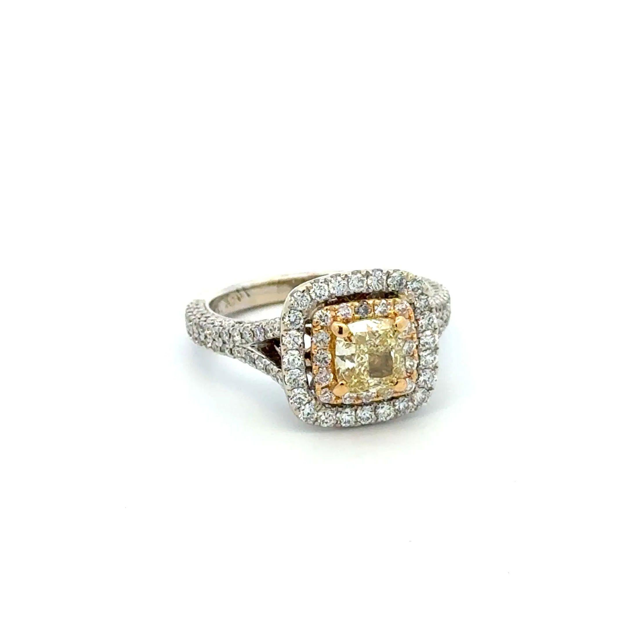 
Simply Beautiful! Natural Fancy Light Yellow and RBC Diamond Solitaire Split Shank Vintage NEIL LANE Ring. Centering a securely nestled Hand set 1.07 Carat Cushion Natural Fancy Light Yellow, Natural Color Diamond GSI. Surrounded and accented on