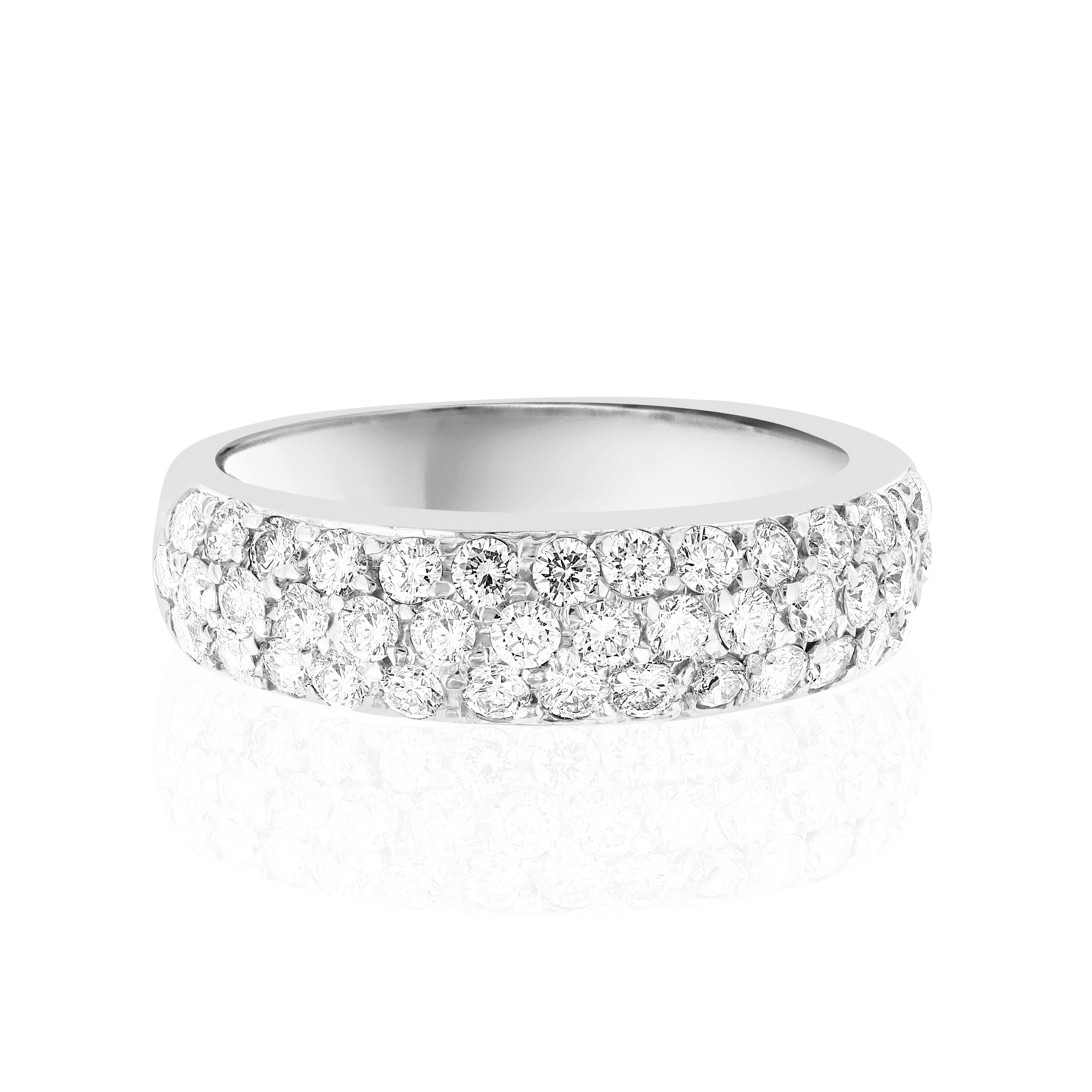 Domed 3 Row Diamond Band.

1.07 Carats set in Platinum.

Size 6.