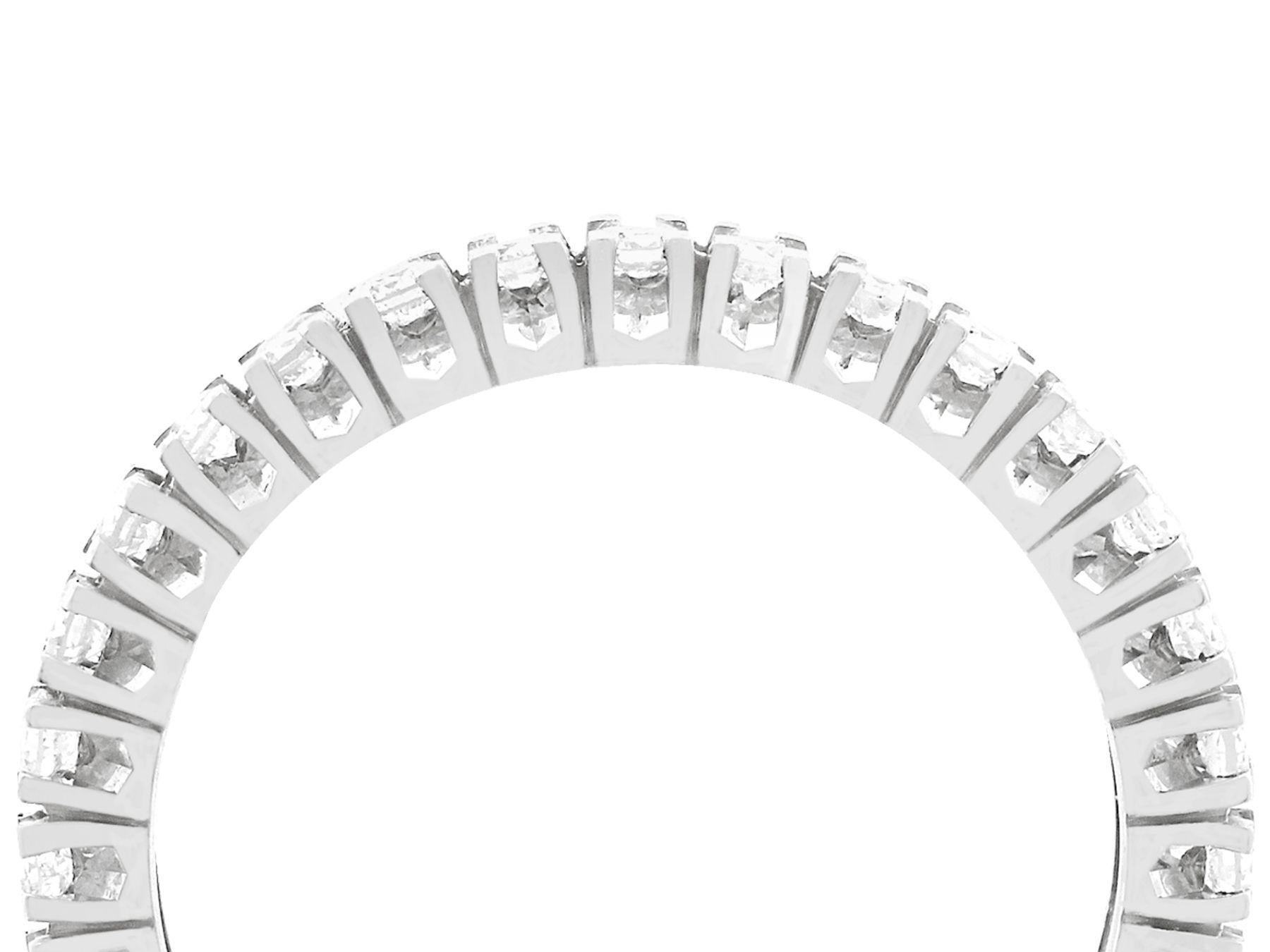An impressive vintage 1980s 1.07 carat diamond and 18 karat white gold full eternity ring; part of our diverse diamond jewelry and estate jewelry collections.

This fine and impressive vintage eternity band ring has been crafted in 18k white