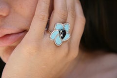 1.07 Carat Faceted Iolite 0.70 Carat VS G Diamonds Turquoise Paste Ring