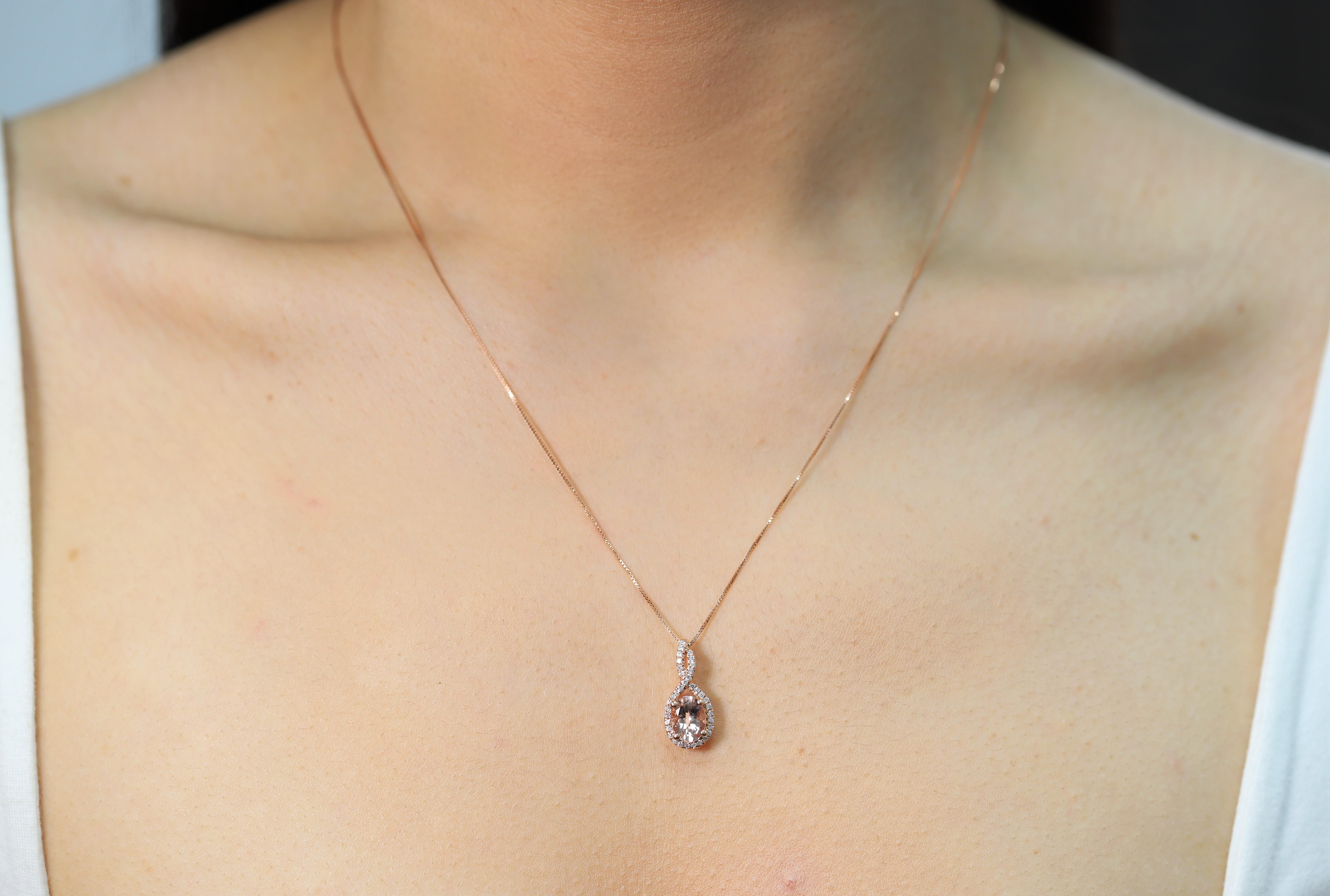 Decorate yourself in elegance with this Pendant is crafted from 10-karat Rose Gold by Gin & Grace Pendant. This Pendant is made up of 6X8 Oval-Cut Prong setting Genuine Genuine Morganite (1 Pcs) 1.07 Carat and Round-Cut Prong setting Natural White