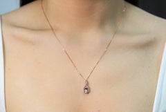 1.07 Carat Morganite Oval Cut Diamond Accents 10K Rose Gold Pendant