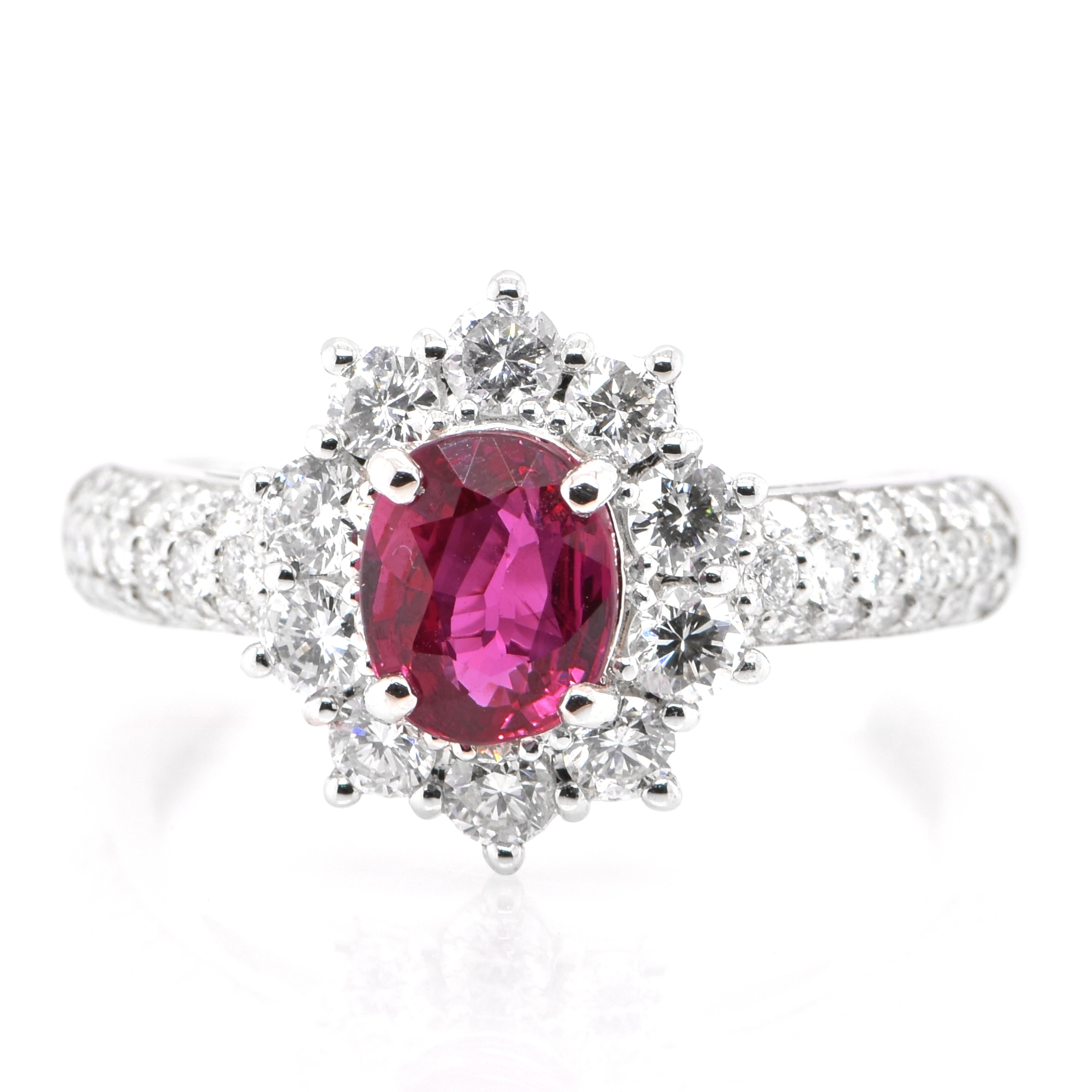 A beautiful ring set in Platinum featuring 1.077 Carats Natural Ruby and 0.73 Carat Diamonds. Rubies are referred to as 