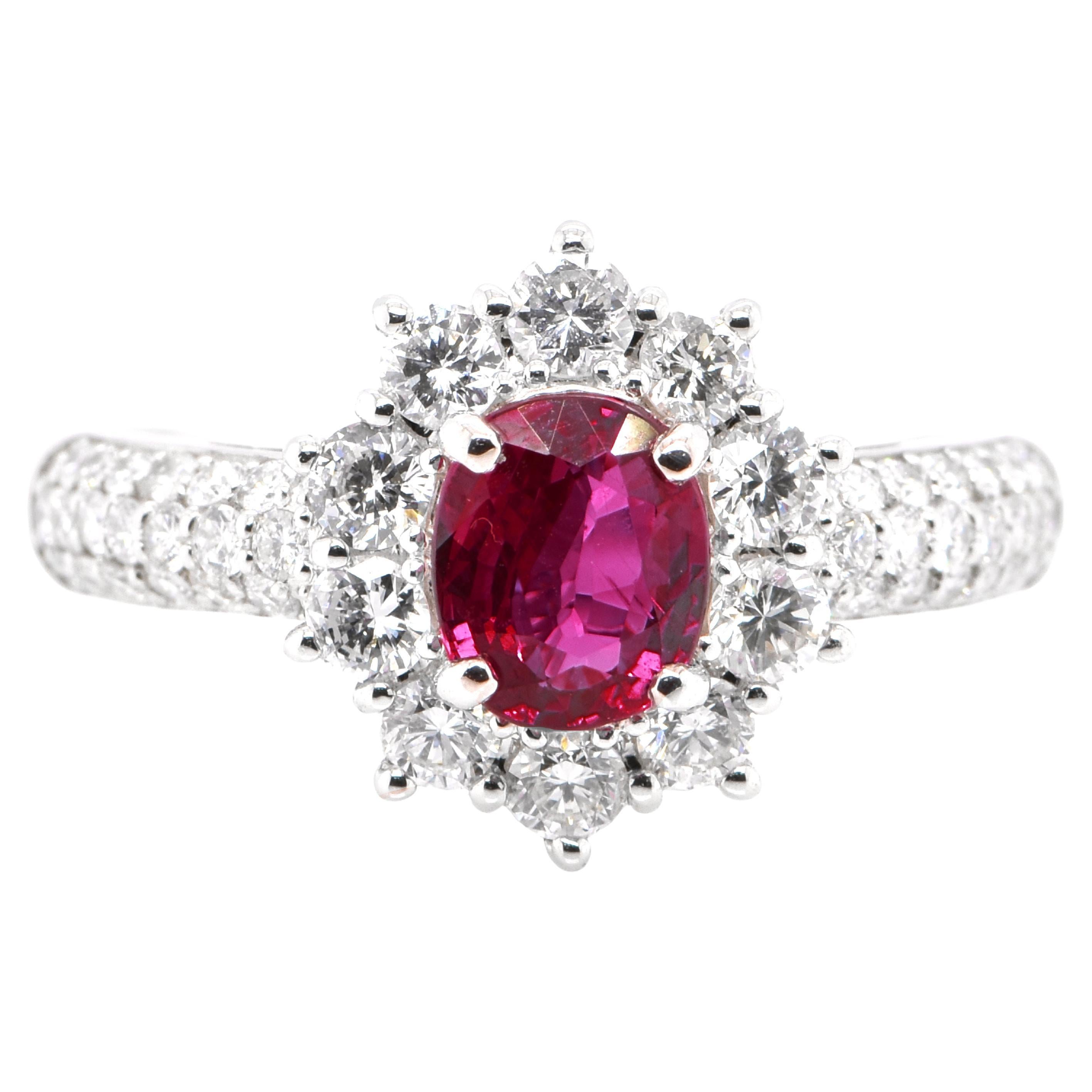 1.07 Carat Natural Ruby and Diamond Halo Ring Set in Platinum For Sale