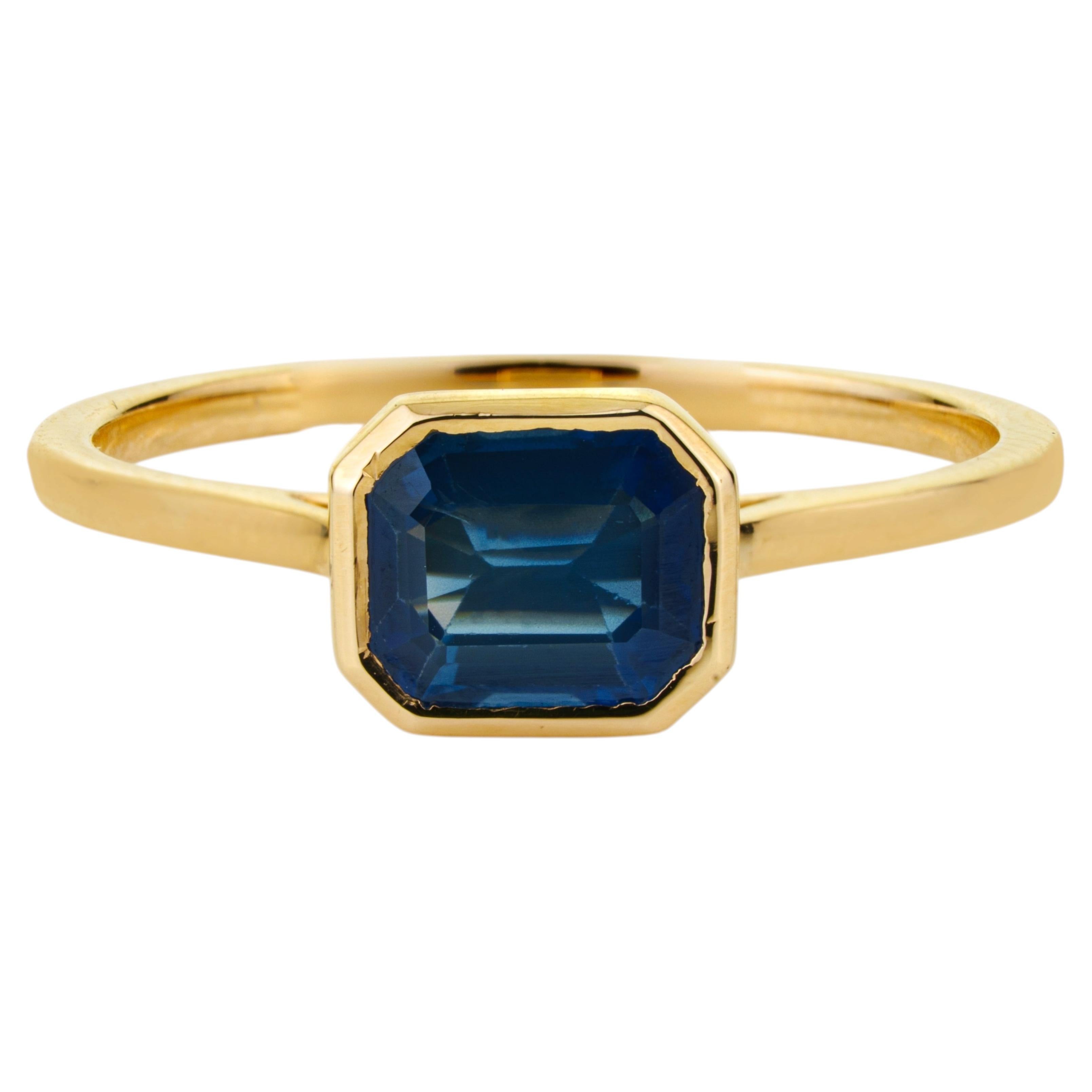 1.07 Carat Octagon Blue Sapphire Solitaire Ring in 14K Yellow Gold Bezel Set