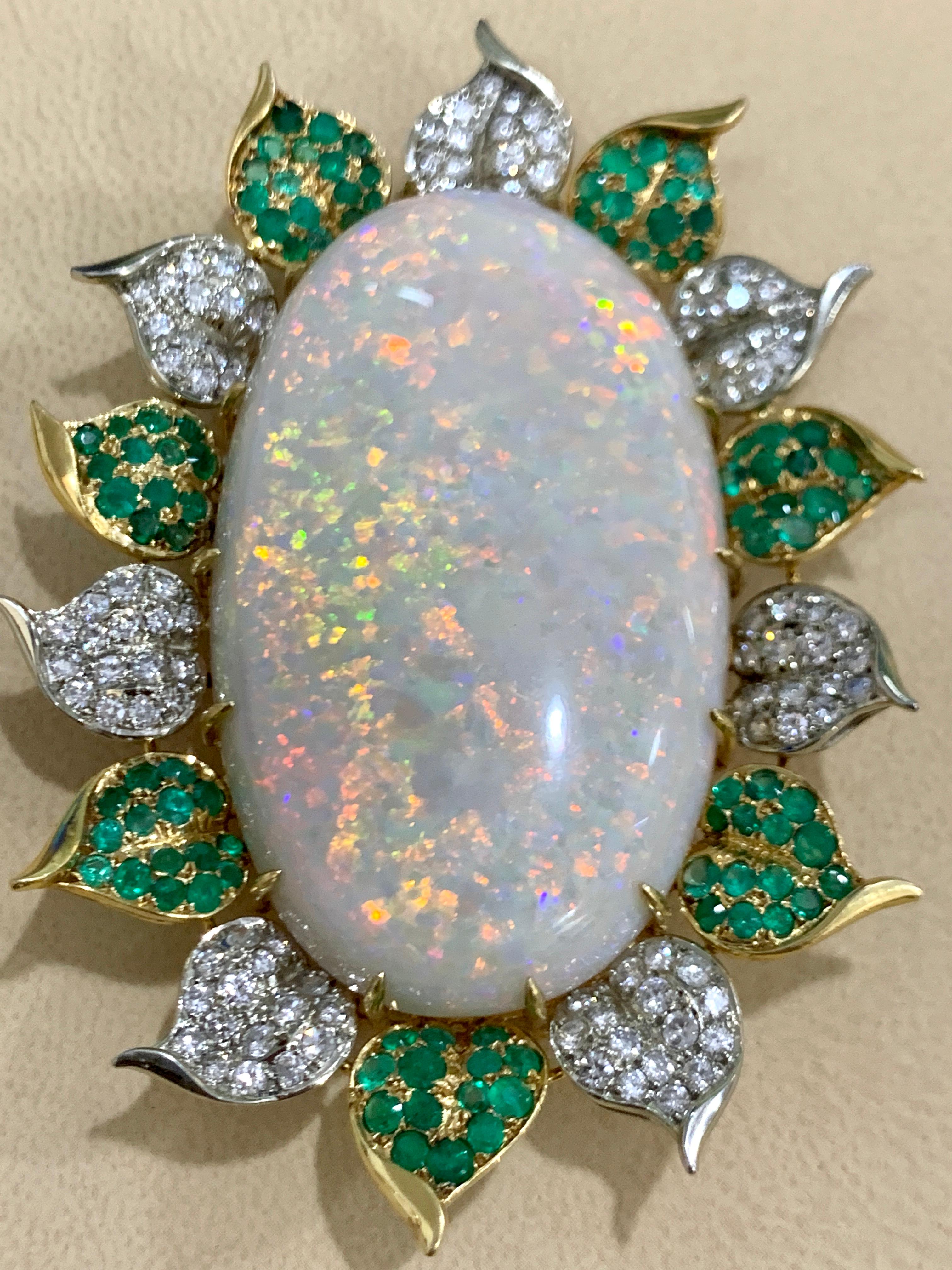 Oval Cut 107 Carat Oval Australian Opal, Diamond and Emerald Pendant /Pin/Broach 18K Gold For Sale