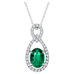 Colgante de esmeralda talla oval de 1,07 quilates y diamante natural de 0,24 quilates en 18k ref2954