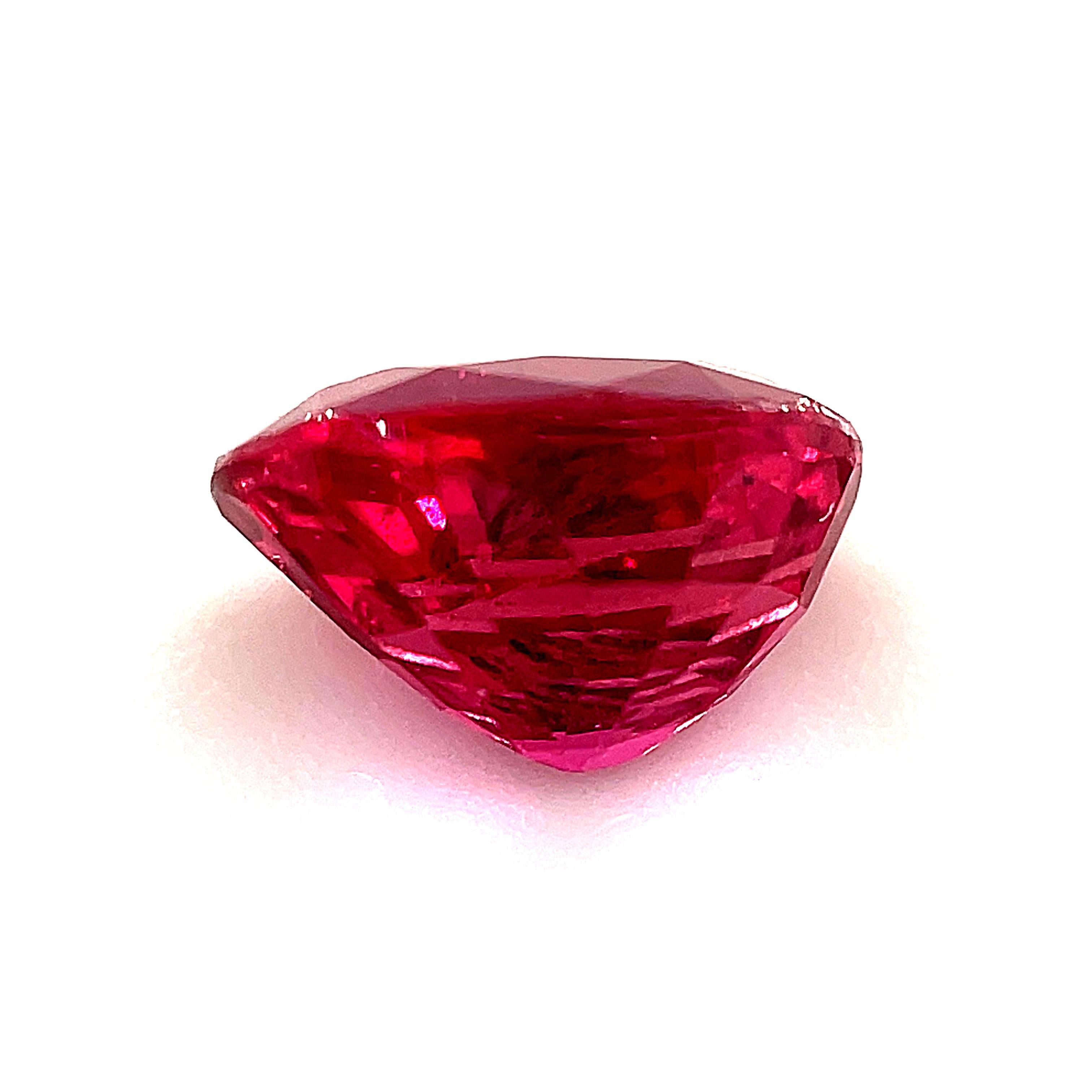 This gorgeous 1.07 carat oval ruby has bright, pure red color and sparkles with rich pink highlights! It measures 6.64 x 4.47mm, is eye clean, and has a lovely, slender shape that will lend itself beautifully to a classic 3-stone ring design. The