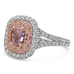 GIA Certified 1.07 Carats Oval Cut Pink Diamond Triple Halo Engagement Ring