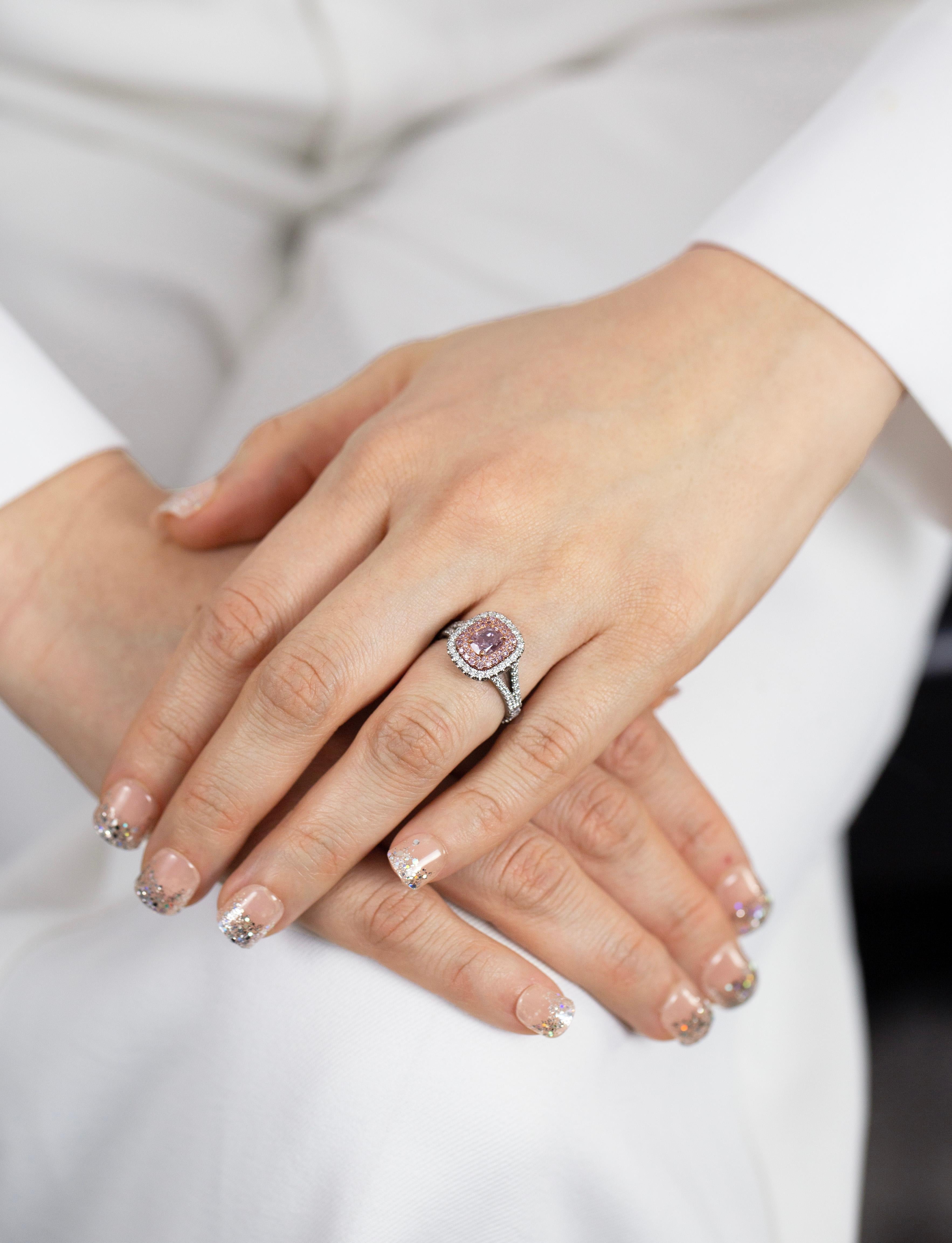 Women's 1.07 Carat Oval Shape Fancy Purplish Pink Diamond Triple Halo Engagement Ring For Sale