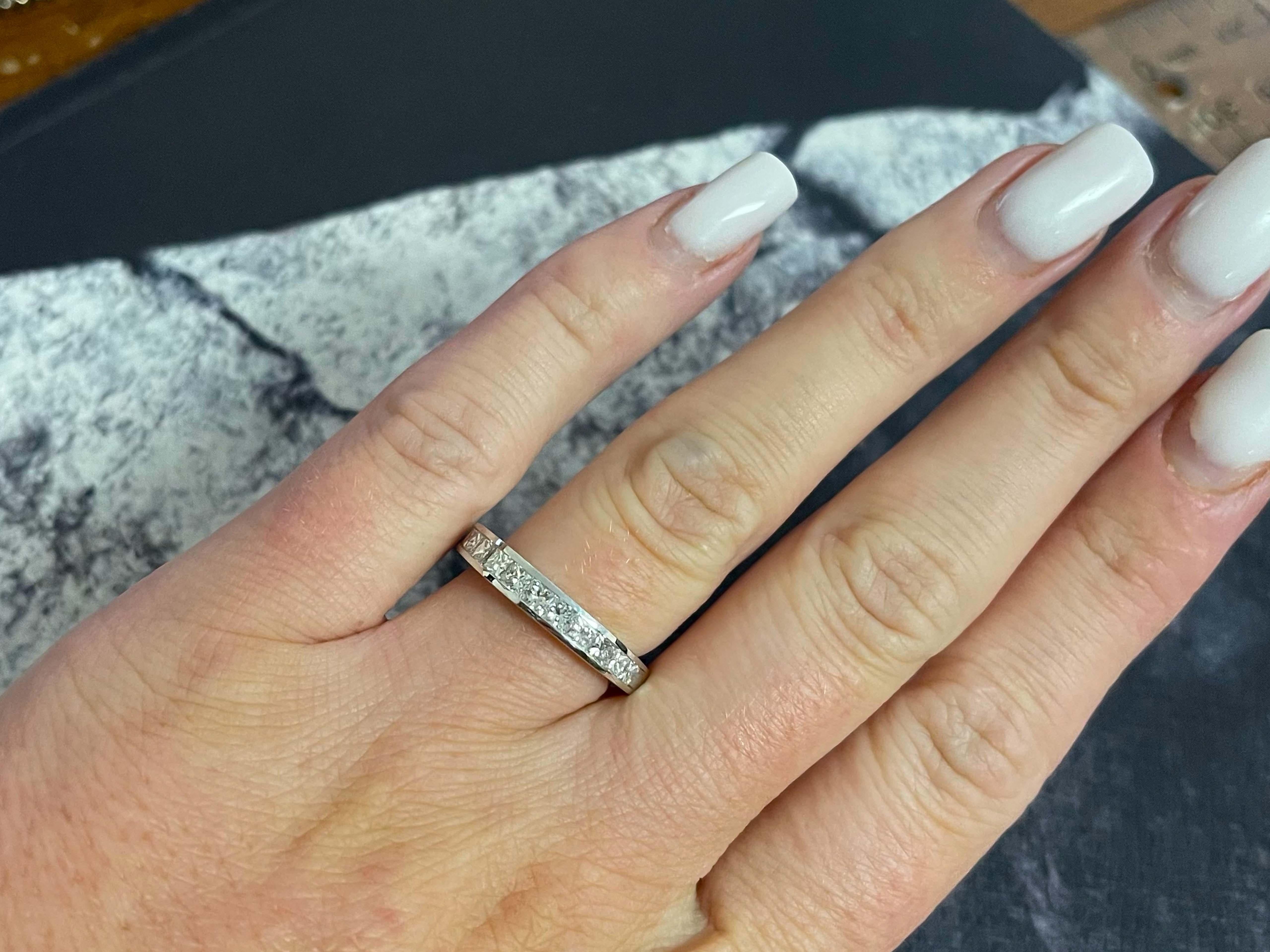 Item Specifications:

Metal: 18k White Gold

Diamond Count: 11 princess cut

Total Diamond Carat Weight: 1.07 carats 

Diamond Color: G-H

Diamond Clarity: SI

Ring Size: 6.5

Total Weight: 3.9 Grams

Stamped: 