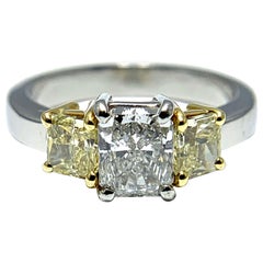 1.07 Carat Radiant Diamond with Radiant Fancy Yellow Diamonds Set in Platinum