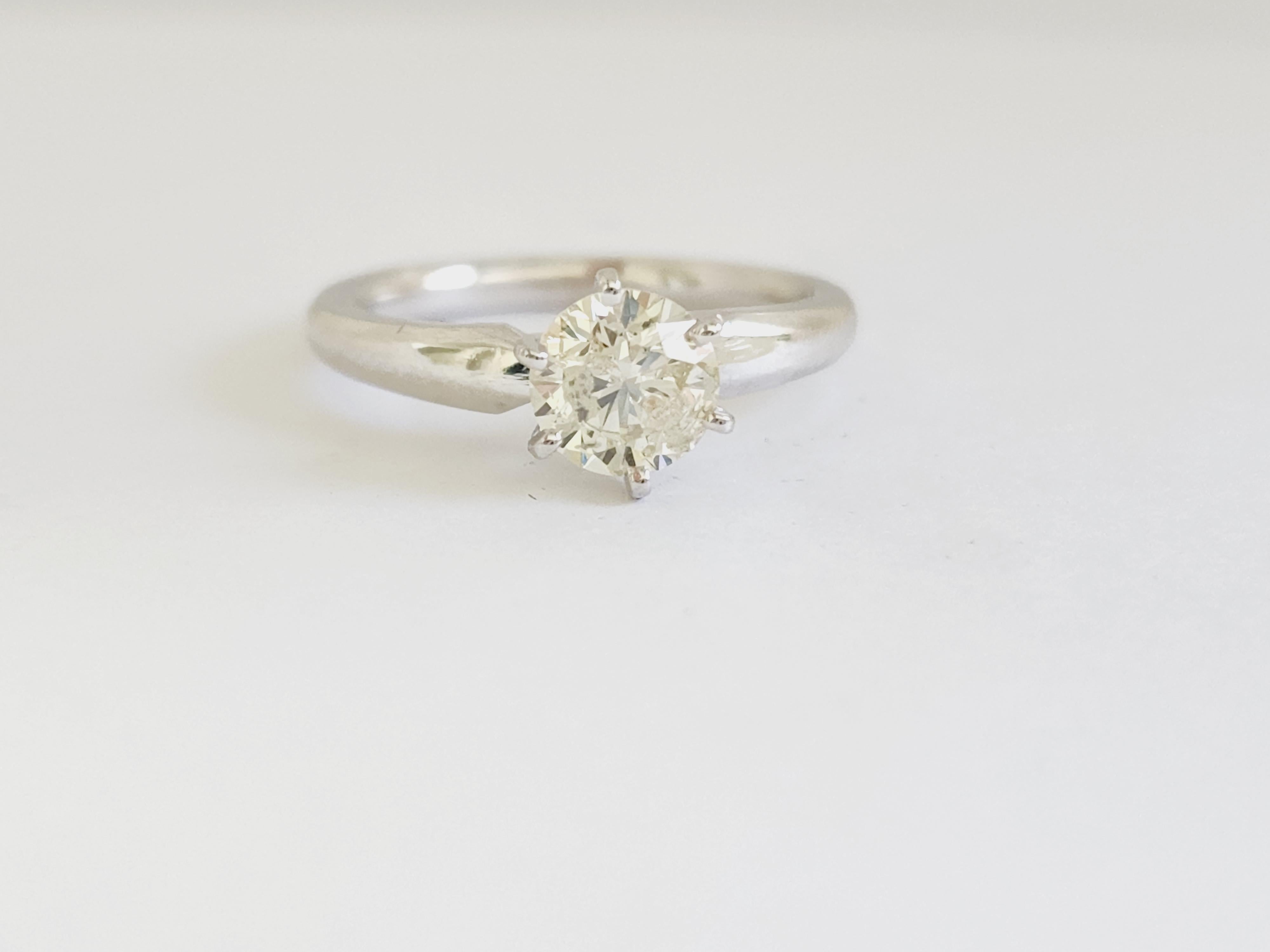1.07 ct round brilliant cut natural diamonds. 6 prong solitaire setting, set in 14k white gold. Ring Size 6.5