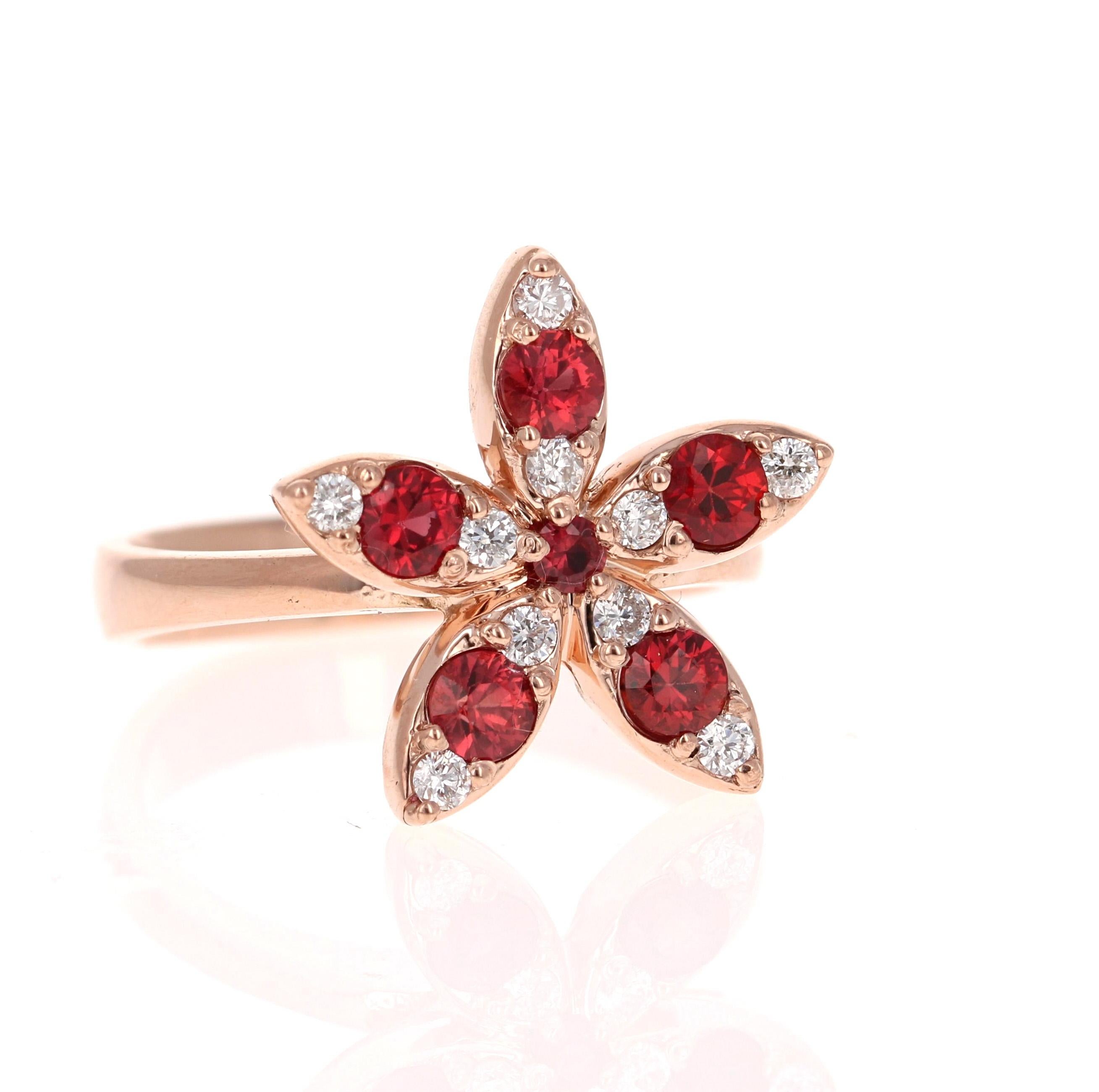 A Stunning and Unique piece to say the least!   Our in-house designer is carefully curated this ring to make it look like the most beautiful flower!

This ring has 6 Round Cut Red sapphires that weigh 0.85 Carats and 10 Round Cut Diamonds that weigh